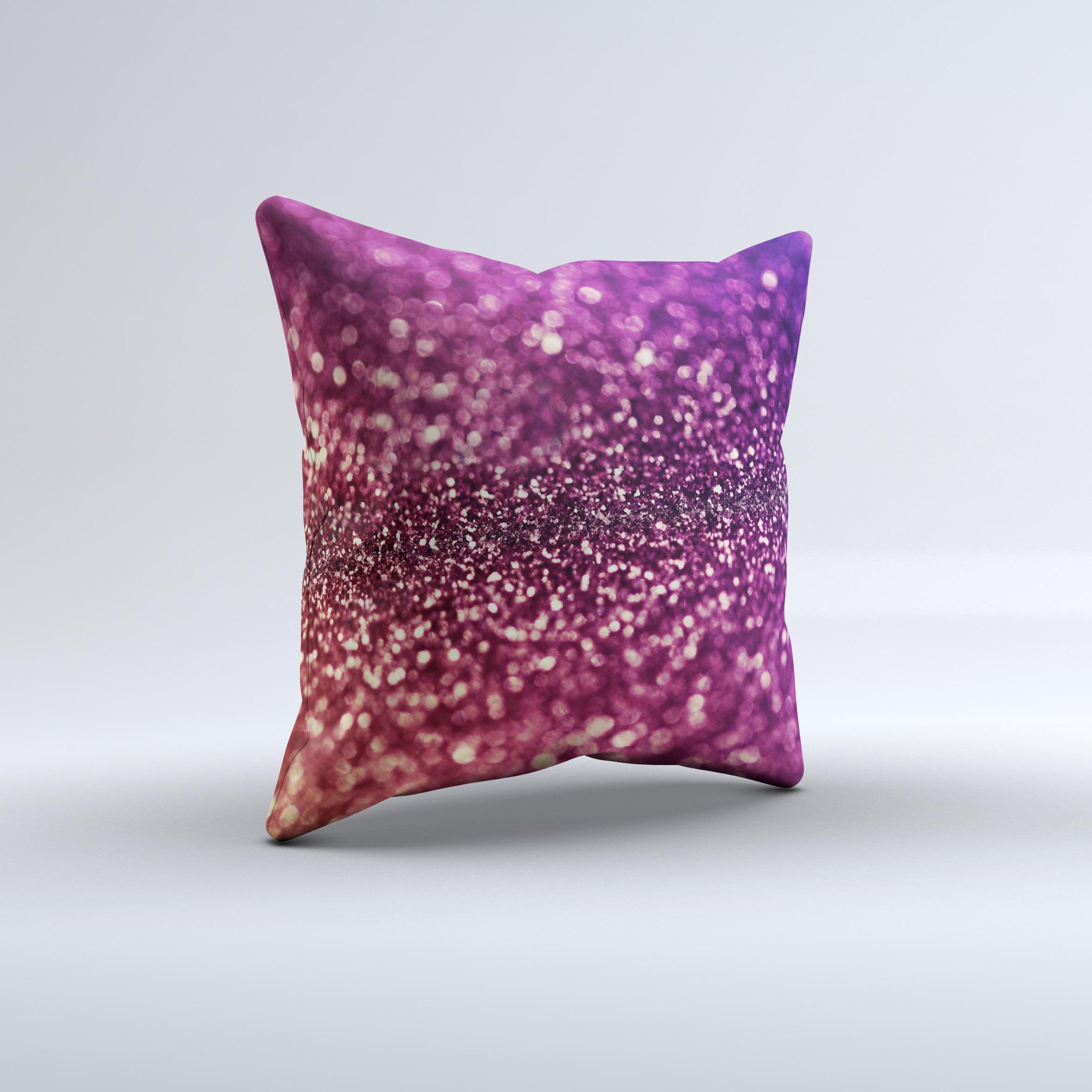 A beautifully handcrafted decorative throw pillow featuring unfocused purple and pink glimmer ink design, showcasing unique imperfections.