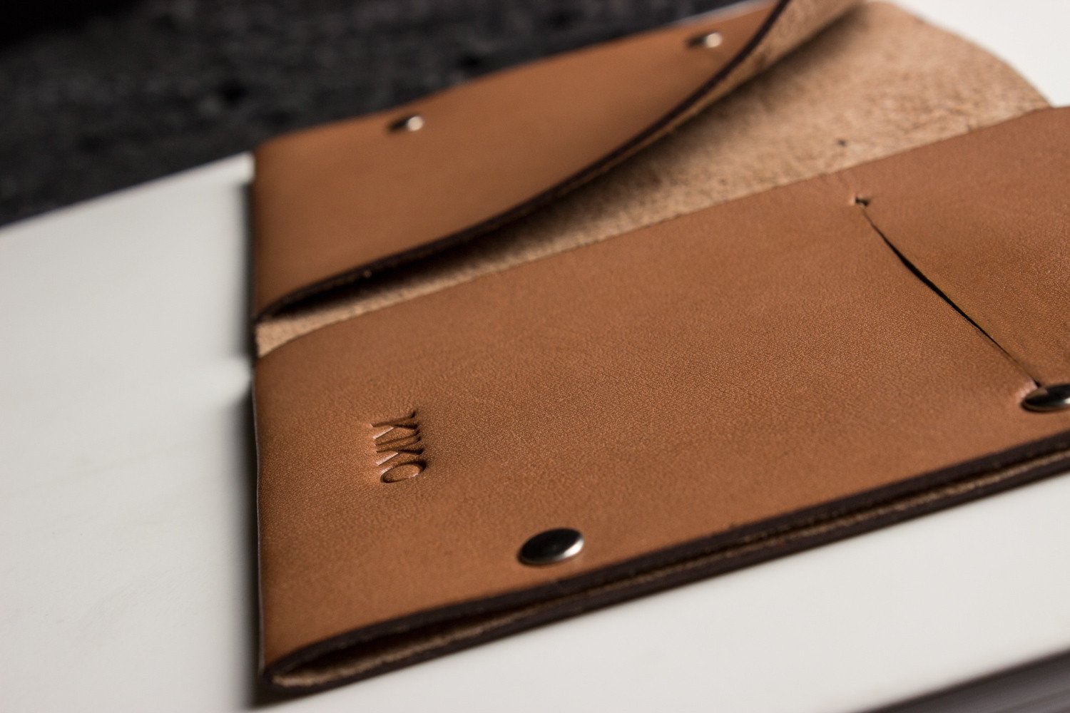 Unstitched Leather Twofold Wallet made from vegetable tanned cowhide, showcasing its handmade craftsmanship and minimalist design.