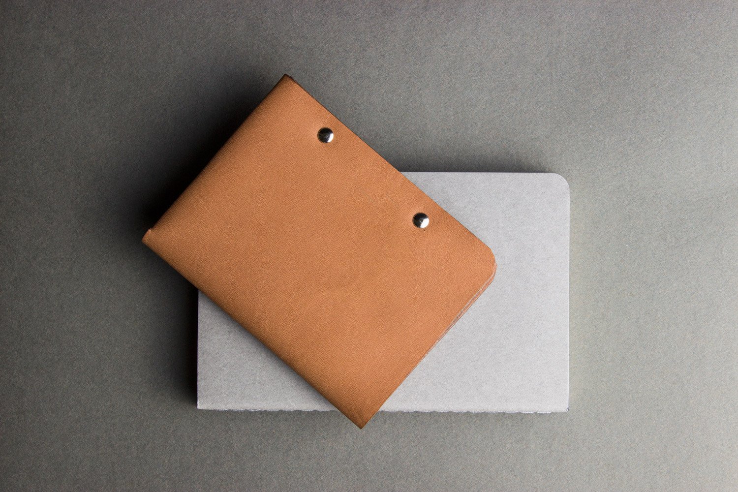 Unstitched Leather Twofold Wallet made from vegetable tanned cowhide, showcasing its handmade craftsmanship and minimalist design.