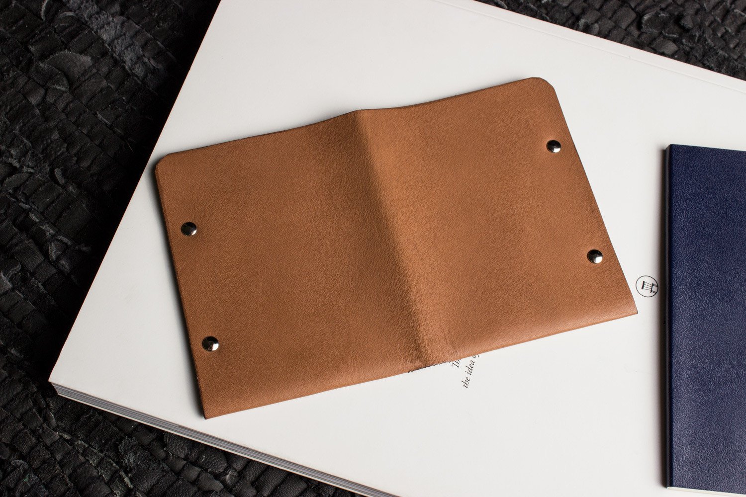 Unstitched Leather Twofold Wallet made from vegetable tanned cowhide, showcasing its handmade craftsmanship and minimalist design.