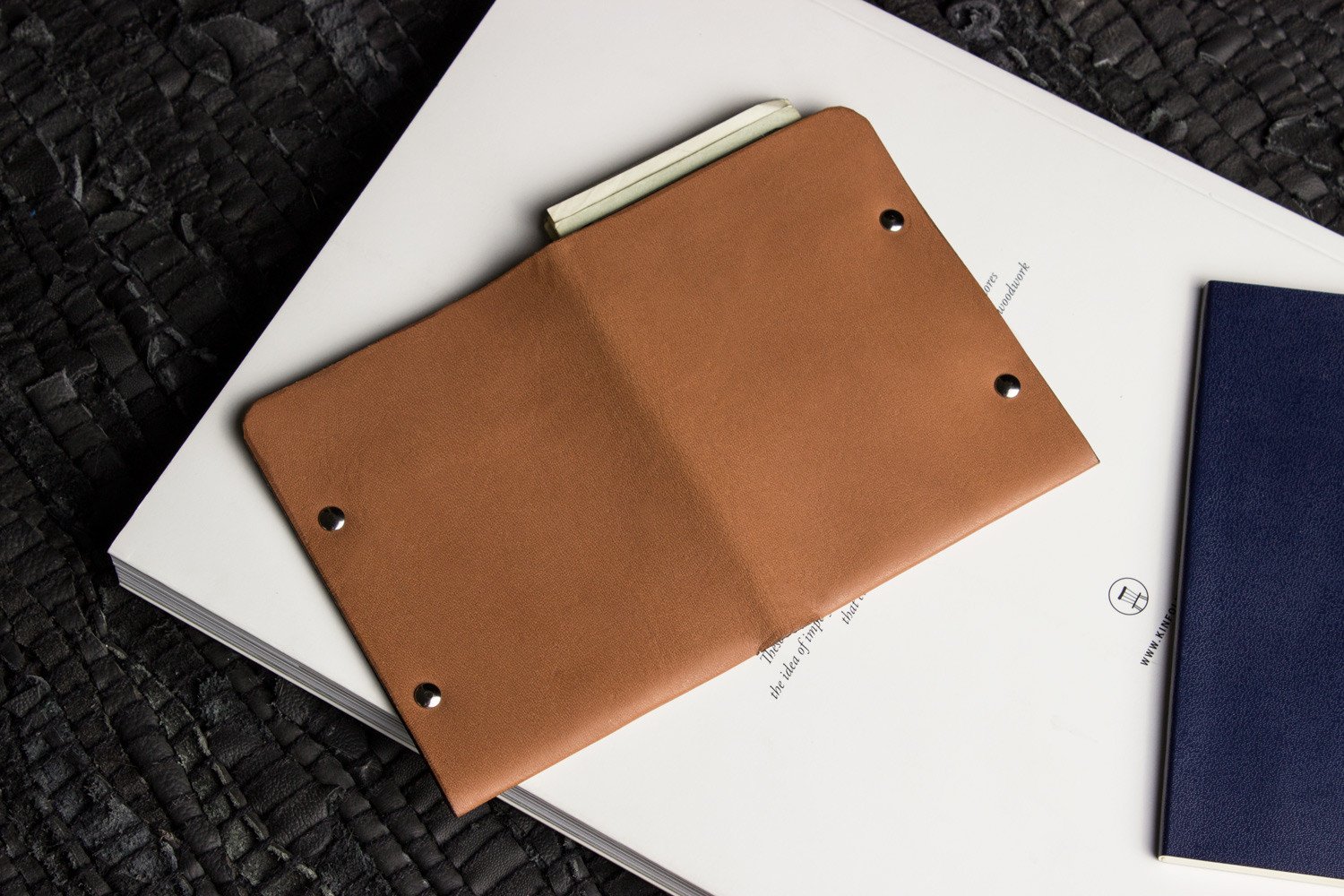 Unstitched Leather Twofold Wallet made from vegetable tanned cowhide, showcasing its handmade craftsmanship and minimalist design.