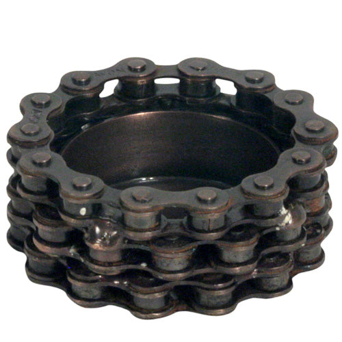 Upcycled bike chain tealight holder, showcasing intricate metalwork and unique design, perfect for eco-friendly decor.