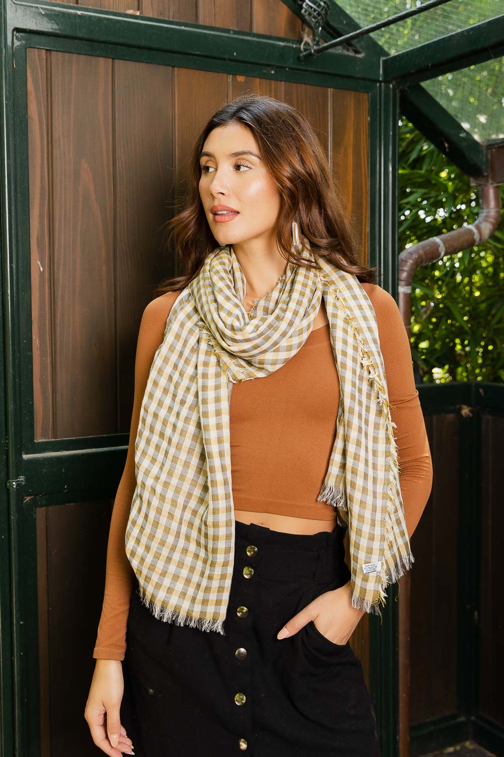 Urban Buffalo Plaid Scarf featuring a contemporary checkered pattern in soft fabric, perfect for stylish warmth.