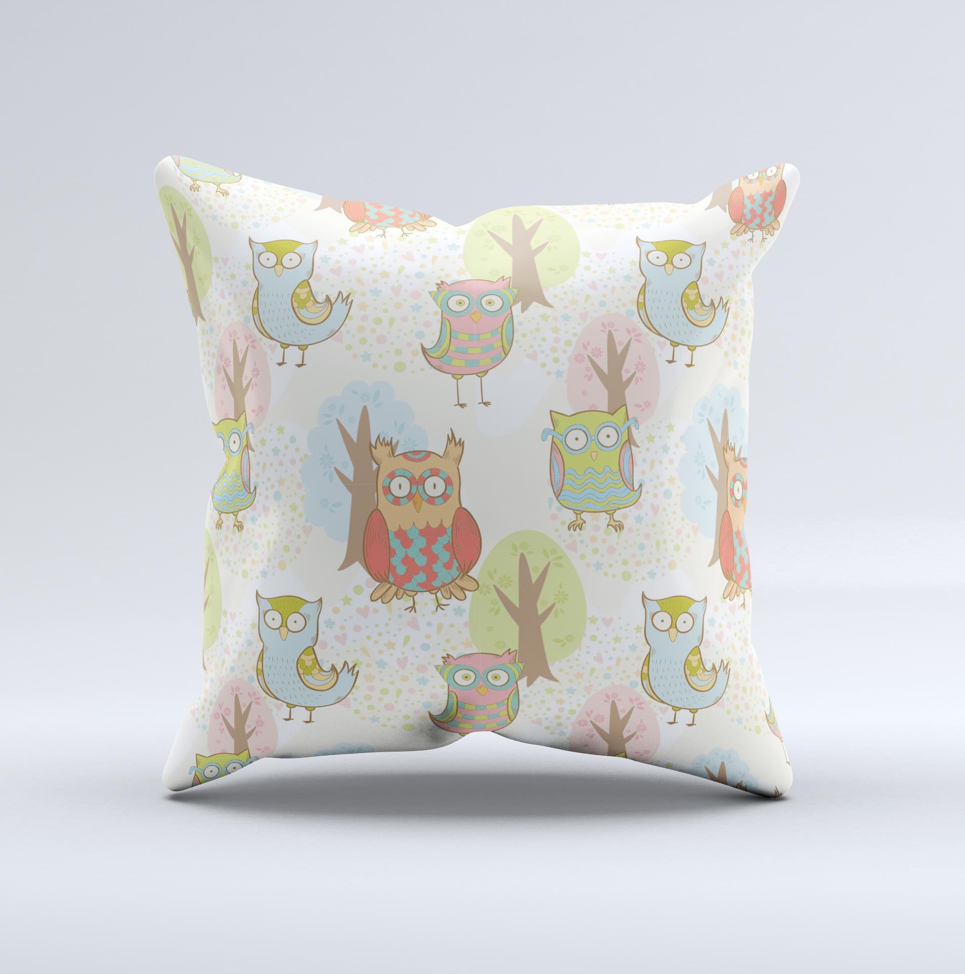 A decorative throw pillow featuring a whimsical cartoon owl pattern, handcrafted with high-quality fabric and filled with non-allergenic polyester.