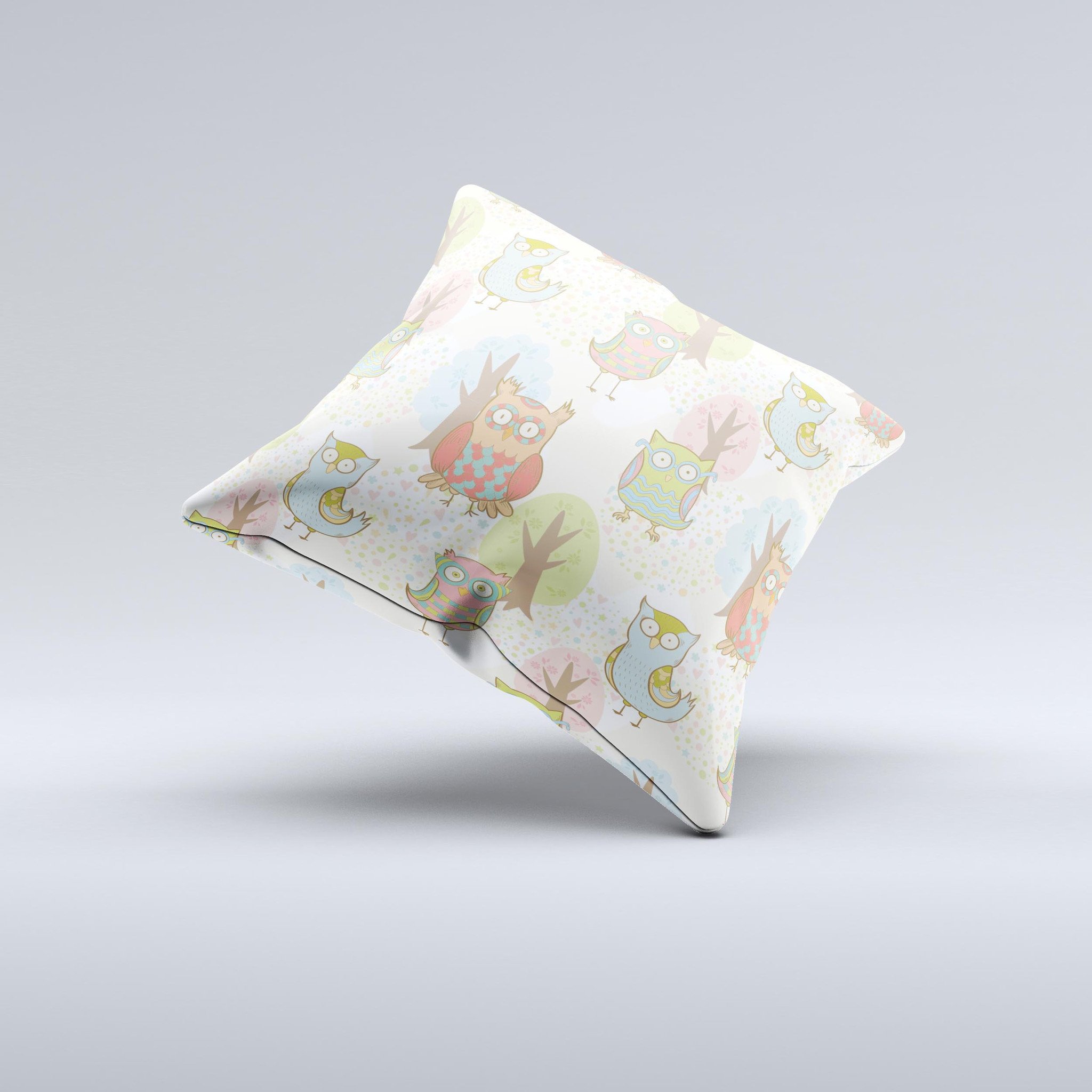 A decorative throw pillow featuring a whimsical cartoon owl pattern, handcrafted with high-quality fabric and filled with non-allergenic polyester.