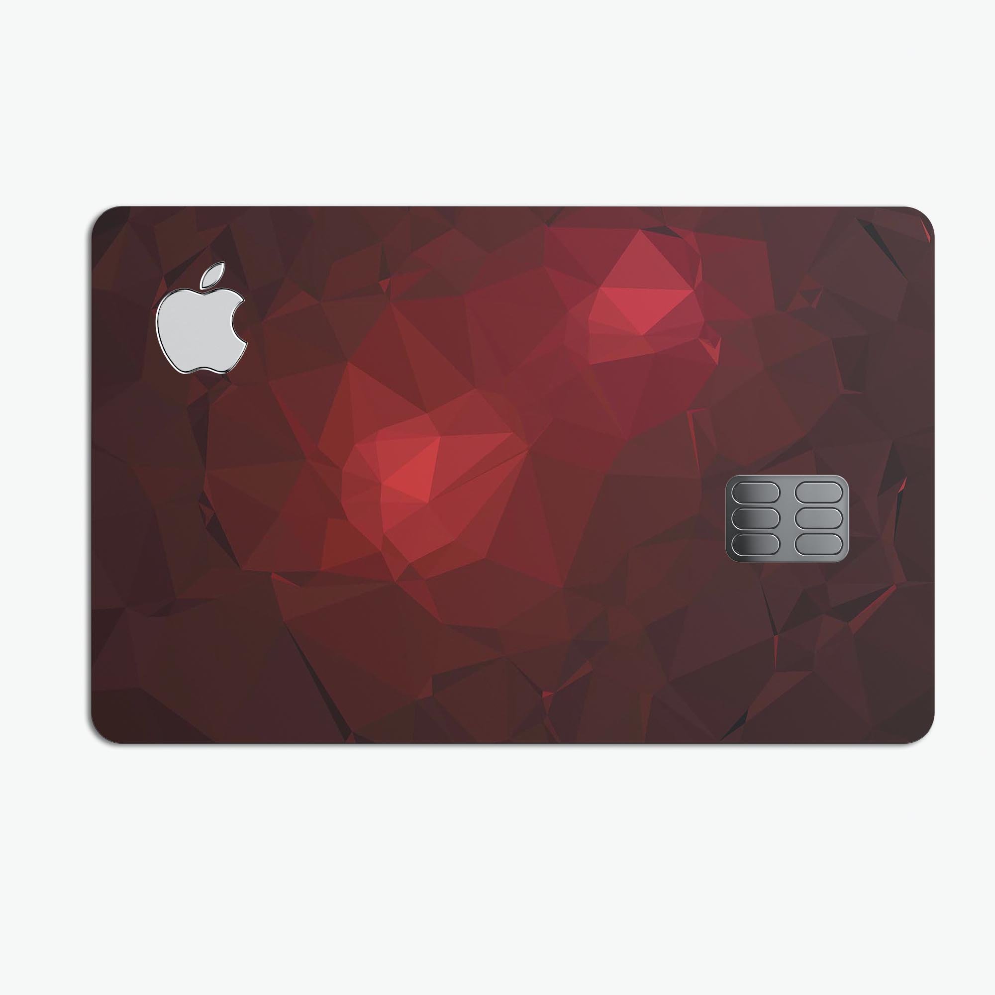 Varying shades of red geometric shapes decal on an Apple Card, showcasing its stylish design and premium quality.