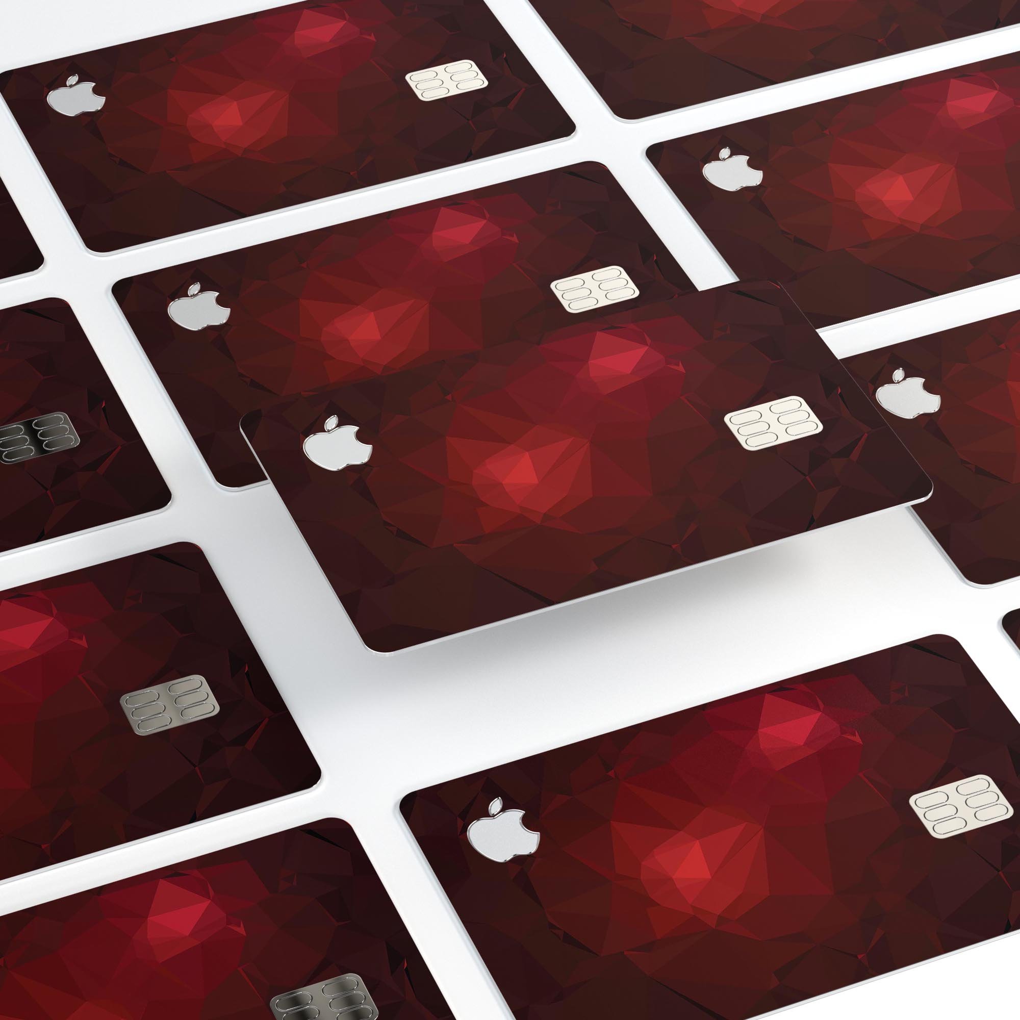 Varying shades of red geometric shapes decal on an Apple Card, showcasing its stylish design and premium quality.