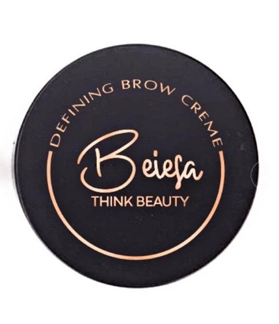 Vegan Defining Brow Creme in Soft Brown, showcasing its matte and smudge-proof texture in a sleek container.