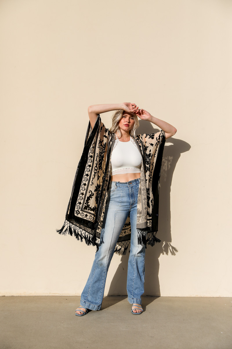 A lightweight Velvet Mesh Tapestry Kimono featuring a bold tapestry print, perfect for layering and stylish outfits.