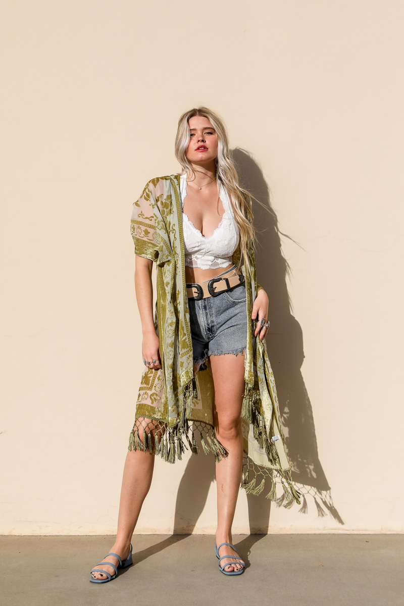 A lightweight Velvet Mesh Tapestry Kimono featuring a bold tapestry print, perfect for layering and stylish outfits.