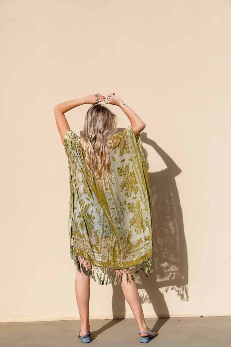 A lightweight Velvet Mesh Tapestry Kimono featuring a bold tapestry print, perfect for layering and stylish outfits.