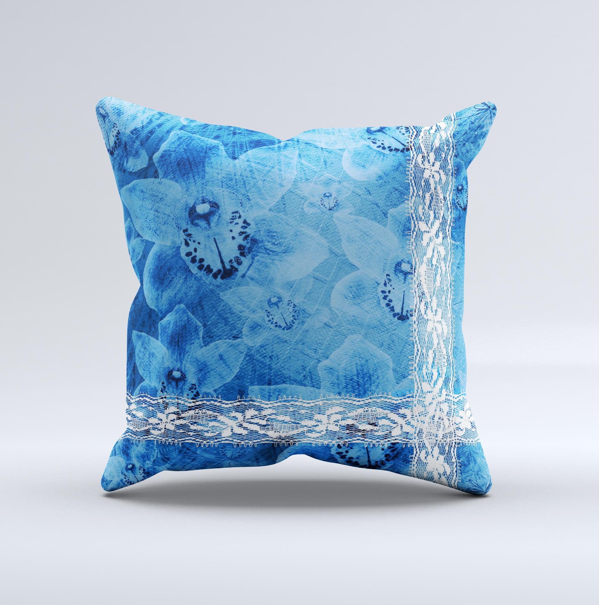 Vibrant blue and white floral lace decorative throw pillow, handcrafted with intricate designs and high-quality fabric.