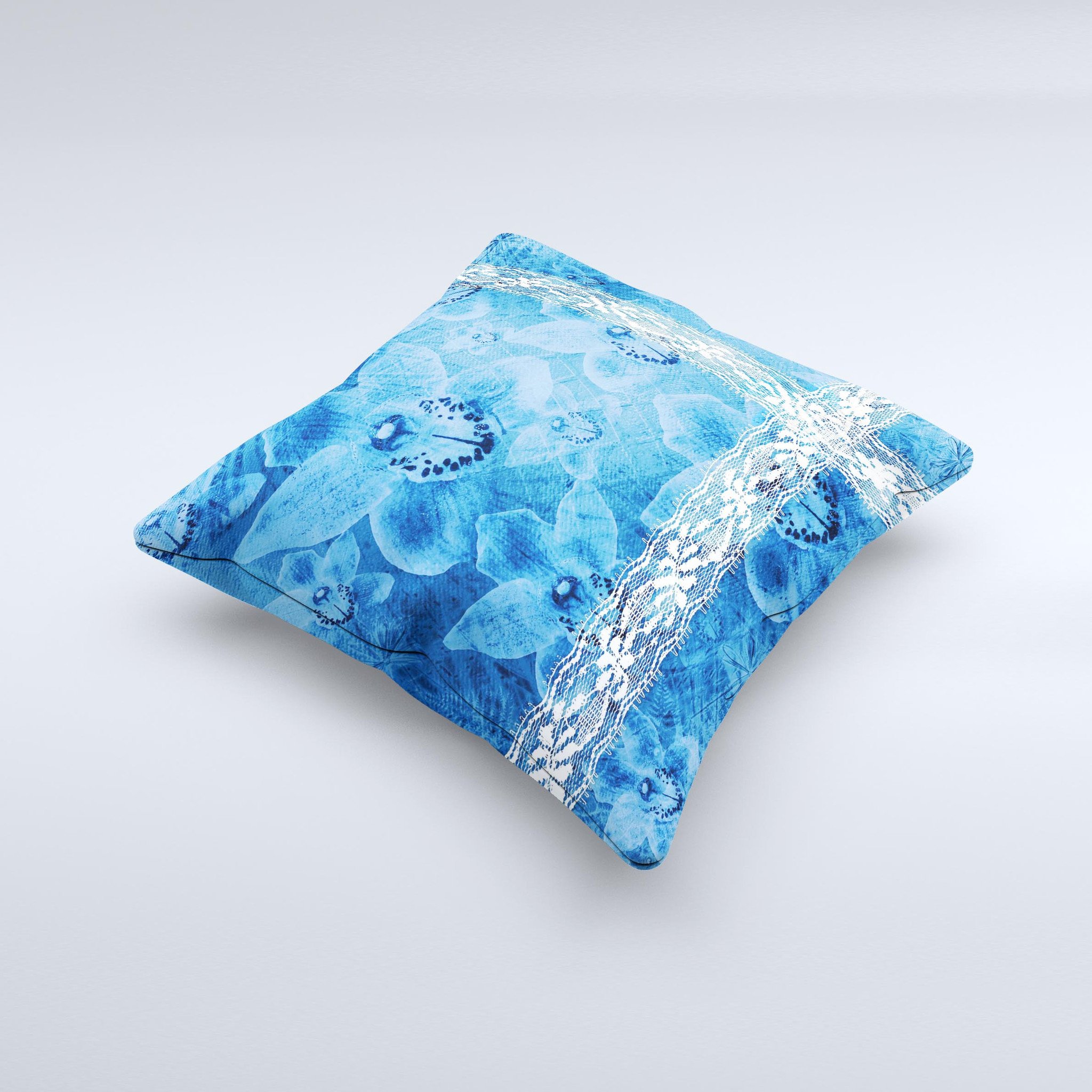 Vibrant blue and white floral lace decorative throw pillow, handcrafted with intricate designs and high-quality fabric.