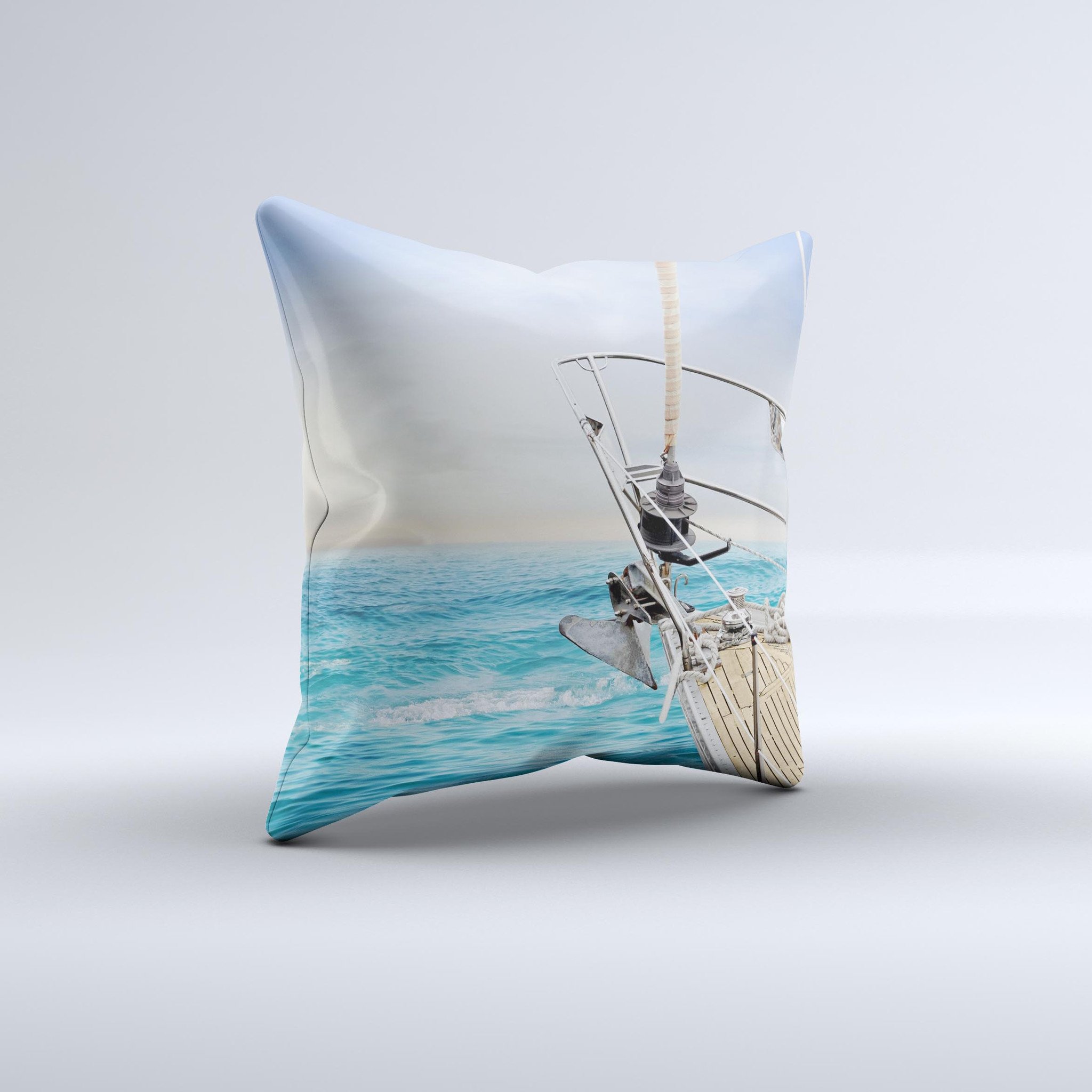 A vibrant decorative throw pillow featuring an ocean view from a ship, showcasing rich colors and intricate details, handcrafted in Virginia.