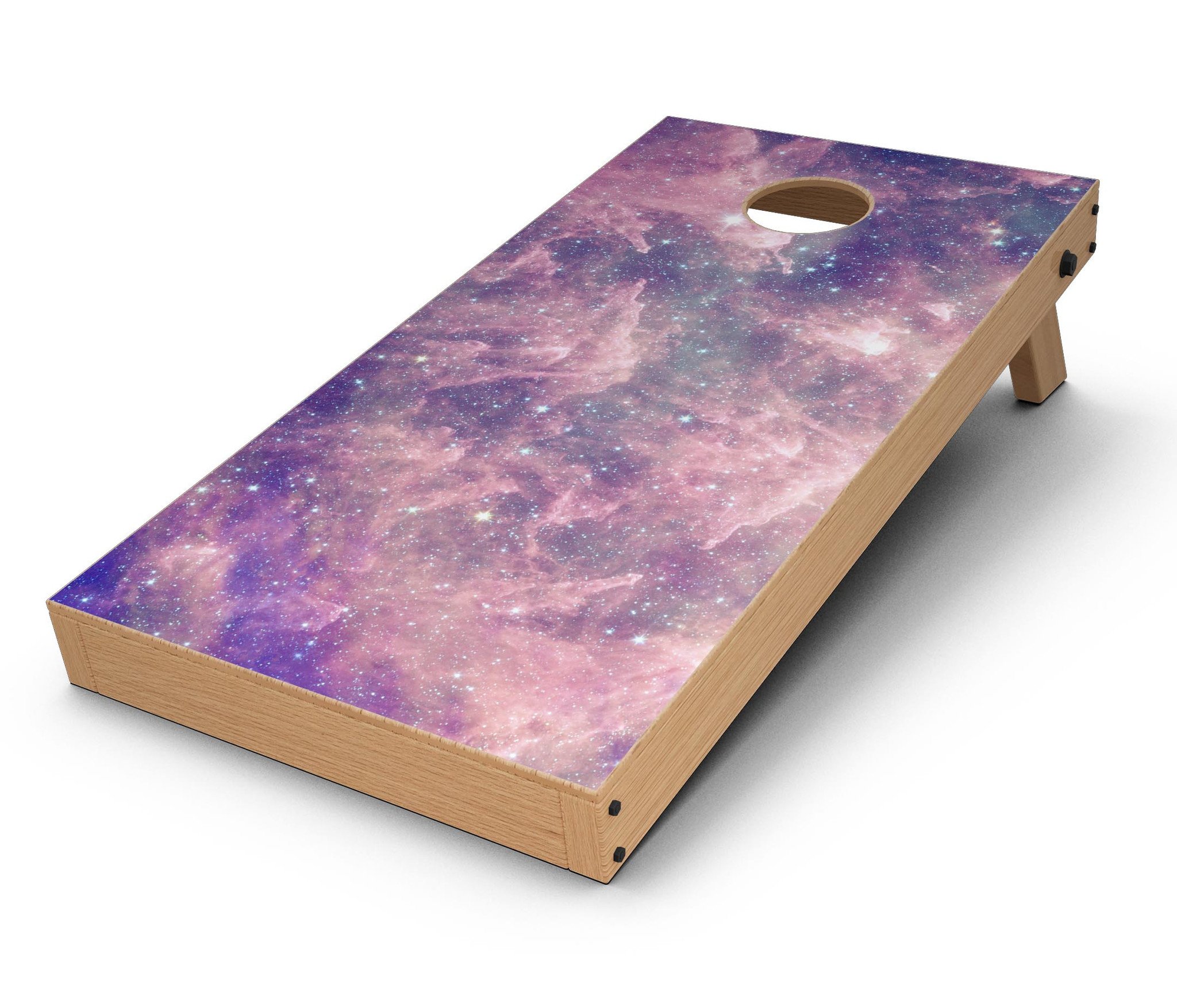 Vibrant sparkly pink nebula Cornhole board skin decal kit displayed on a wooden surface, showcasing its colorful design.