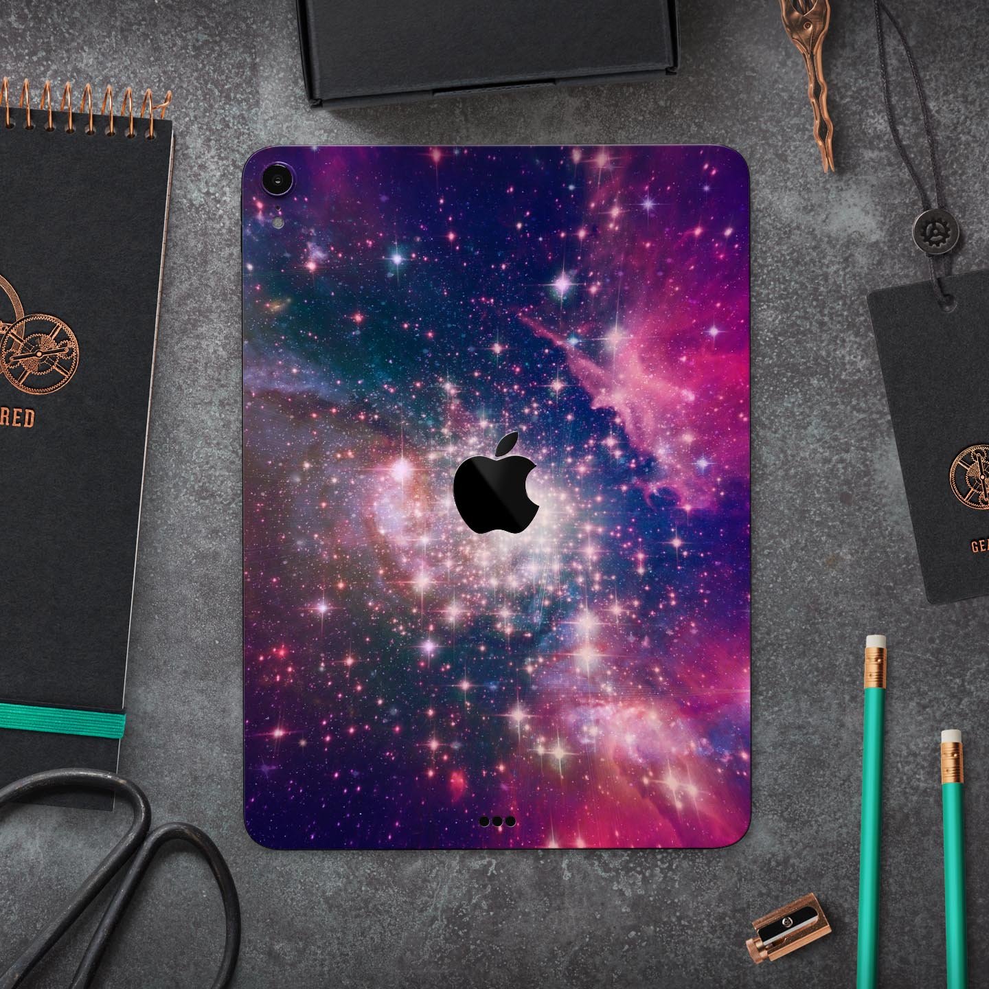 Vibrant Sparkly Pink Space skin decal for Apple iPad, showcasing a colorful and glossy design with a protective layer.