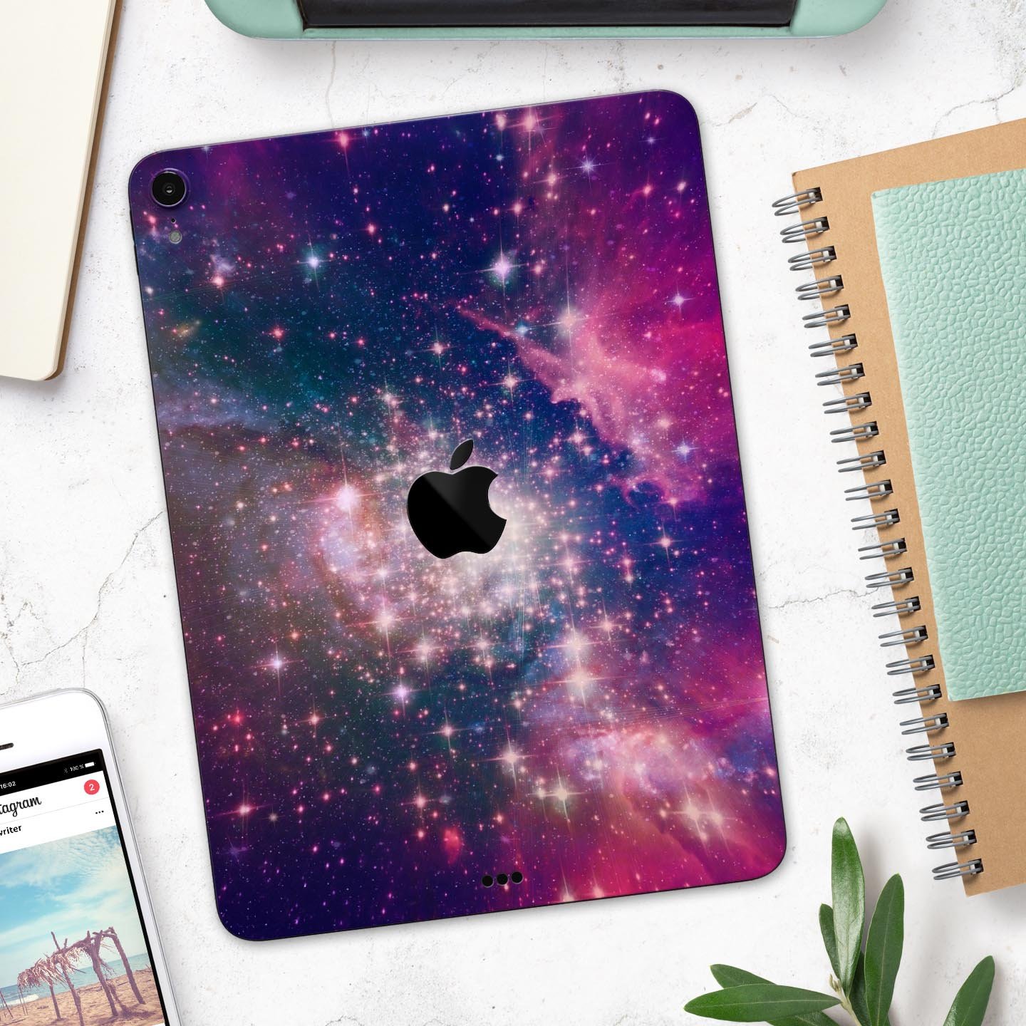 Vibrant Sparkly Pink Space skin decal for Apple iPad, showcasing a colorful and glossy design with a protective layer.