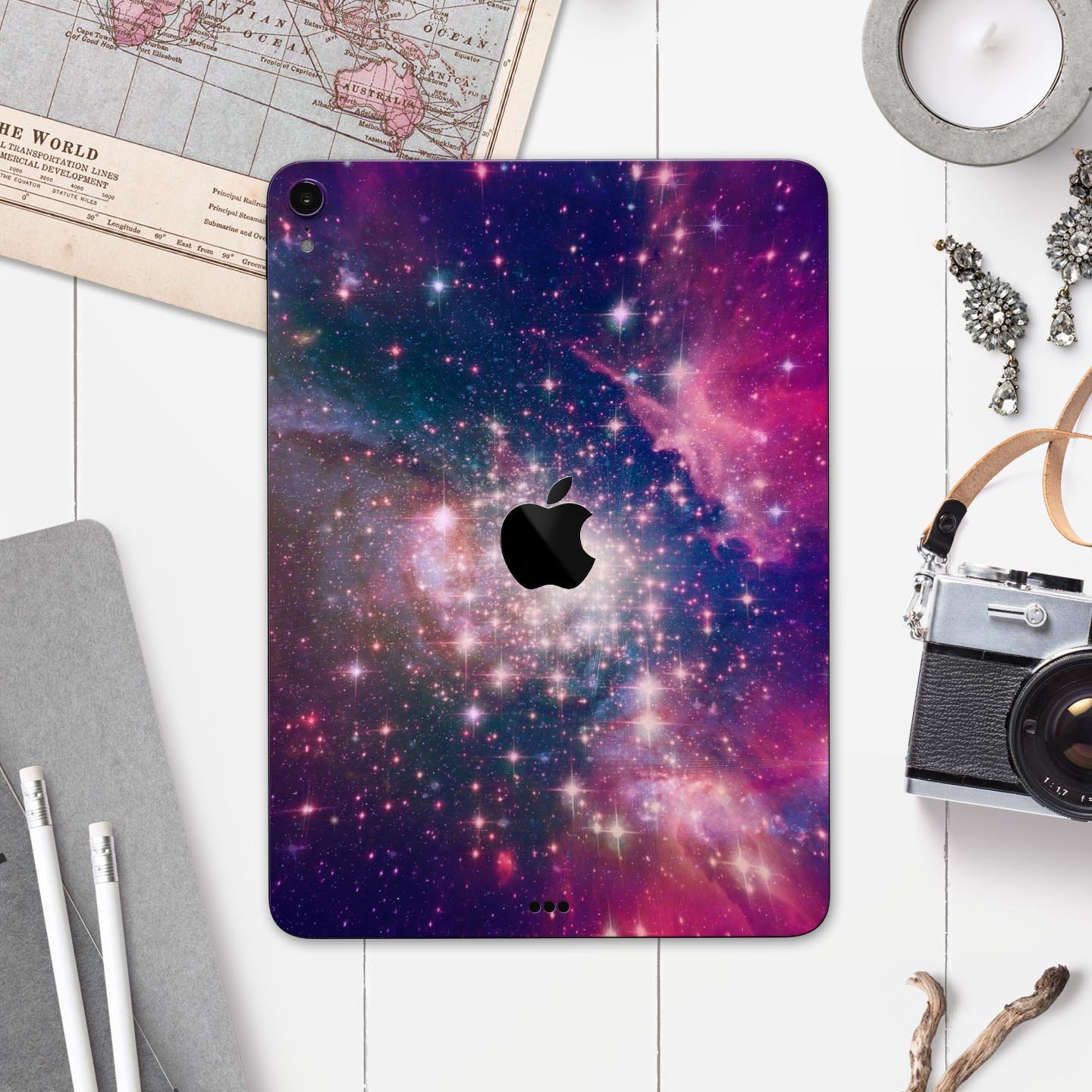 Vibrant Sparkly Pink Space skin decal for Apple iPad, showcasing a colorful and glossy design with a protective layer.