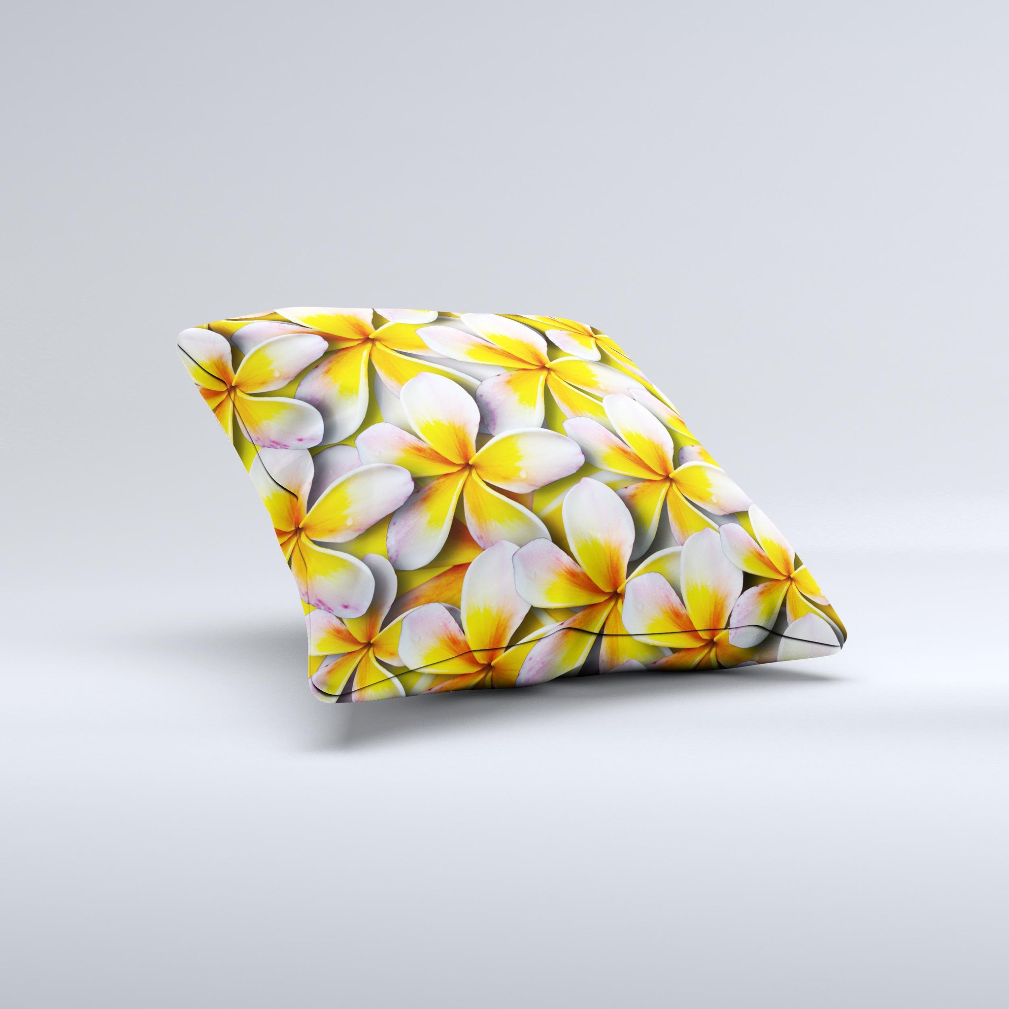 A vibrant yellow decorative throw pillow featuring a floral pattern, handcrafted in Virginia with high-quality materials.