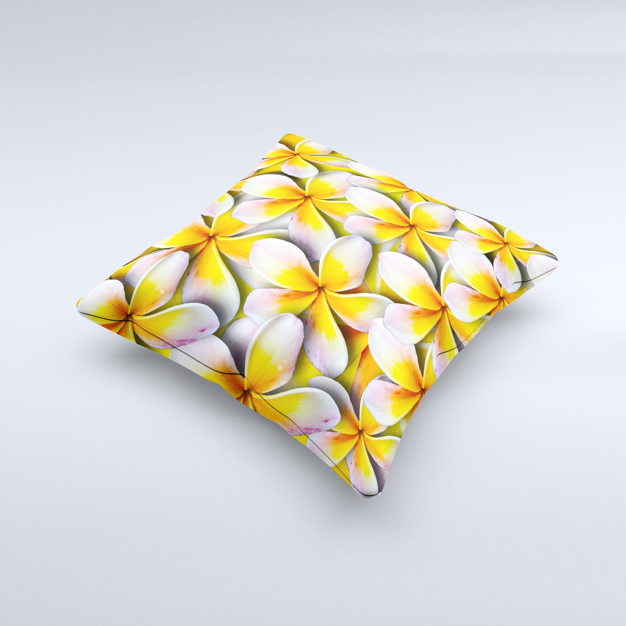 A vibrant yellow decorative throw pillow featuring a floral pattern, handcrafted in Virginia with high-quality materials.