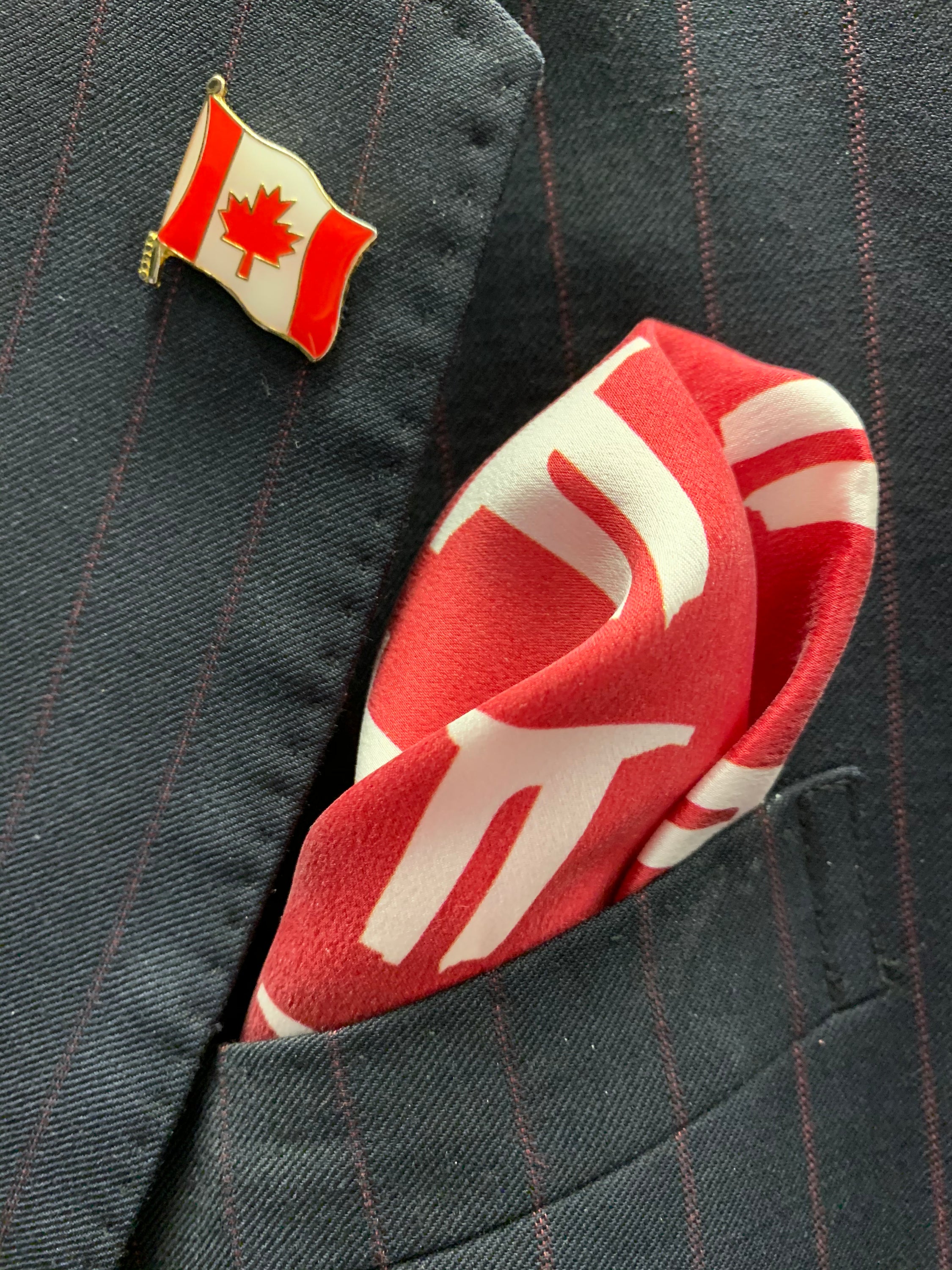 Vimy Monument Red Pocket Square featuring the iconic Vimy Ridge Monument on a vibrant red background, made from 100% silk.