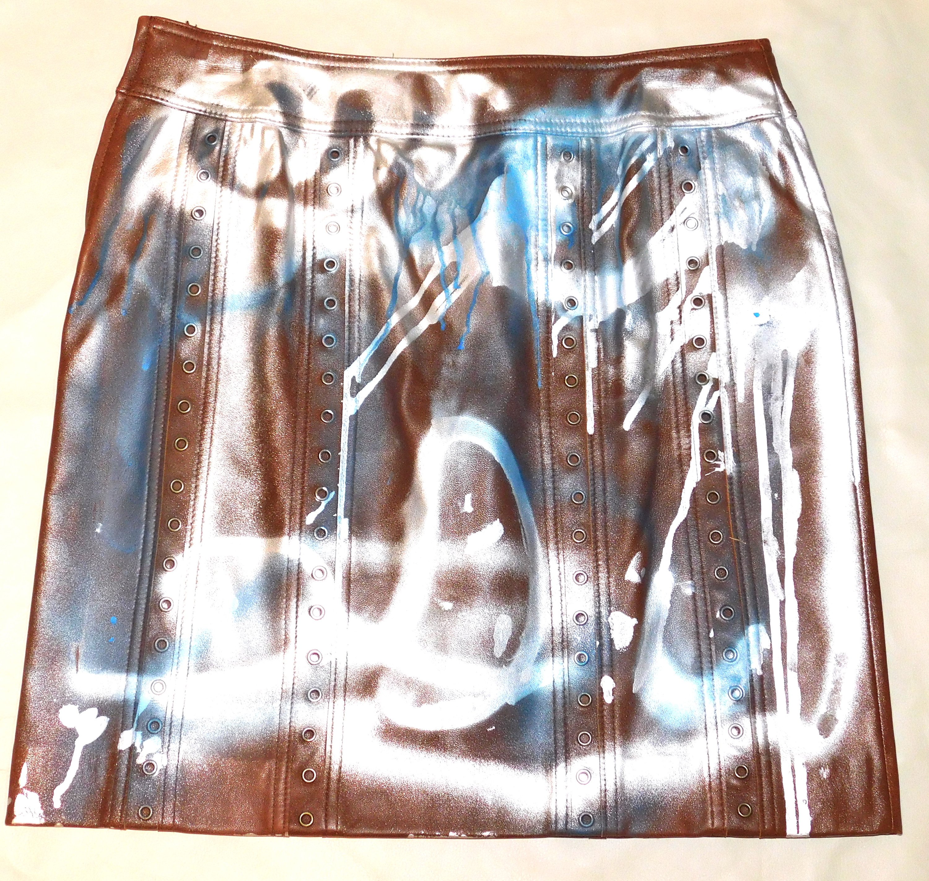 Vintage Leather Graphic COCO MINI Skirt featuring unique graphic design, handmade in Los Angeles, showcasing soft leather material.