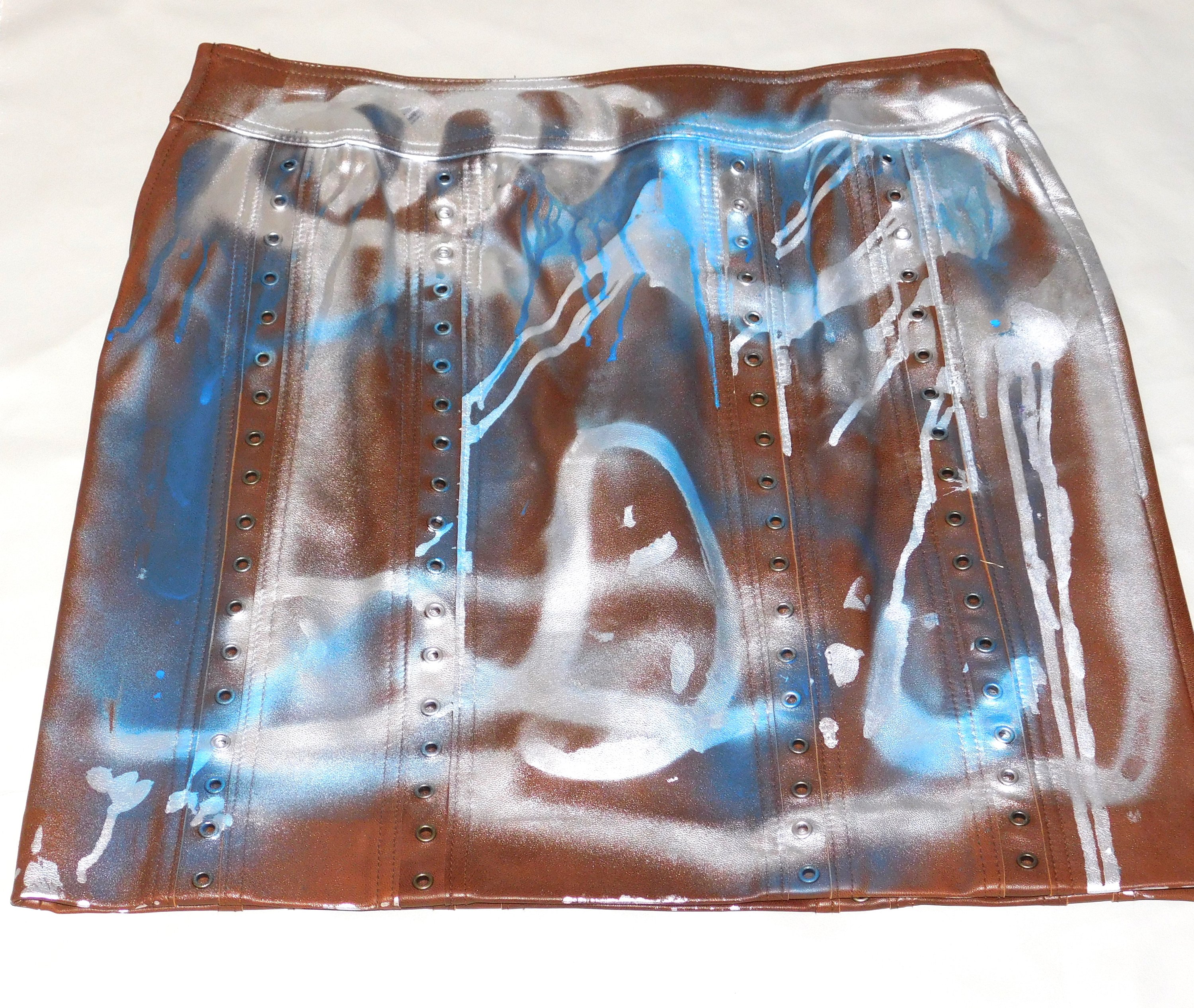 Vintage Leather Graphic COCO MINI Skirt featuring unique graphic design, handmade in Los Angeles, showcasing soft leather material.