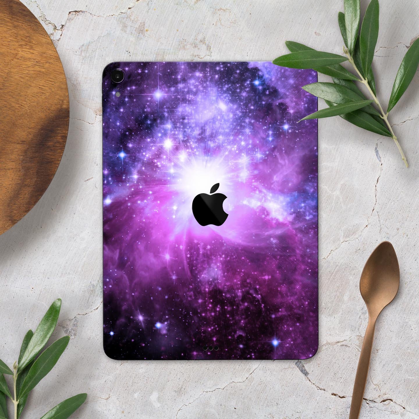 Violet Glowing Nebula skin decal for Apple iPad Pro, showcasing vibrant colors and a cosmic design.