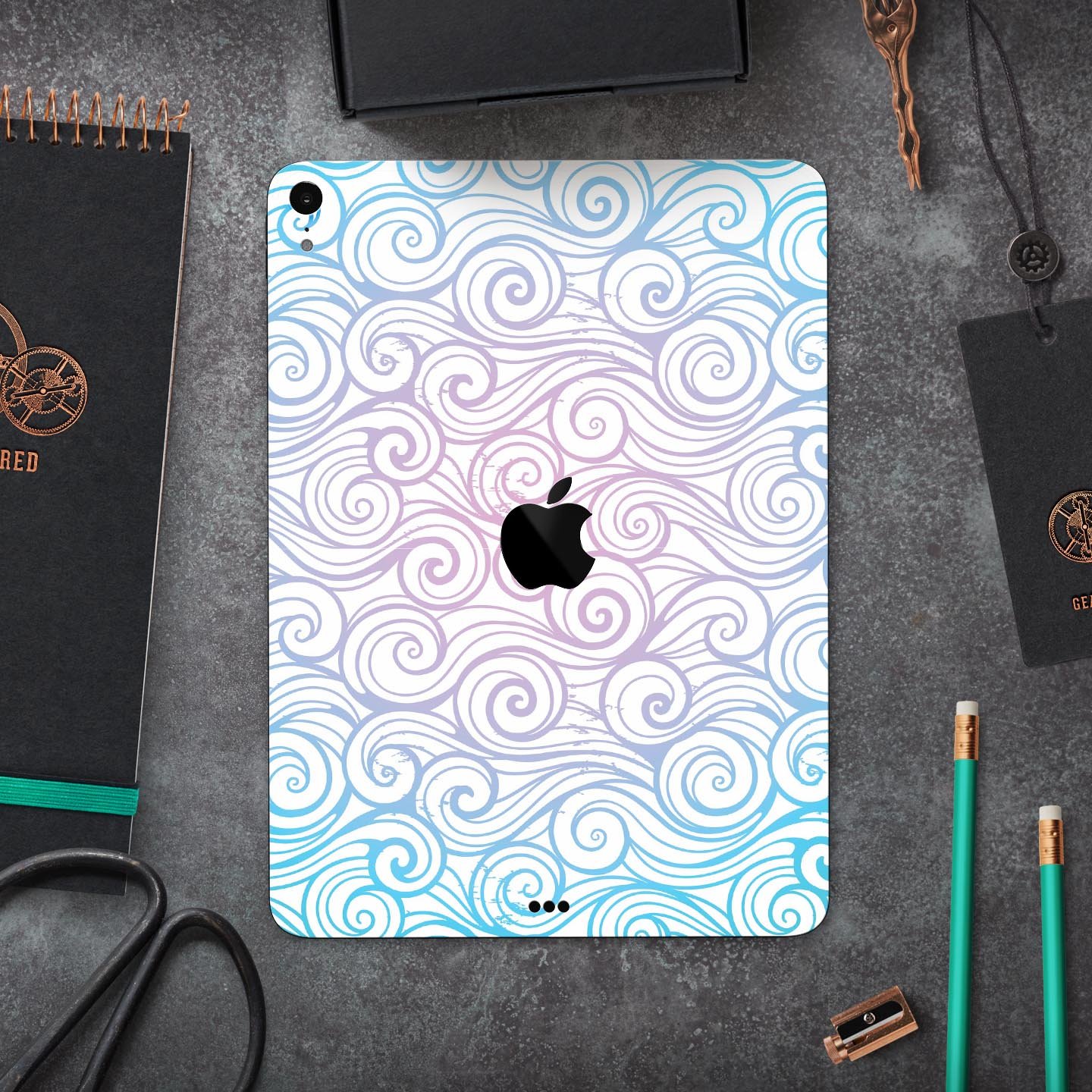 Vivid Blue Gradient Swirl skin decal for Apple iPad, showcasing vibrant colors and a sleek design.