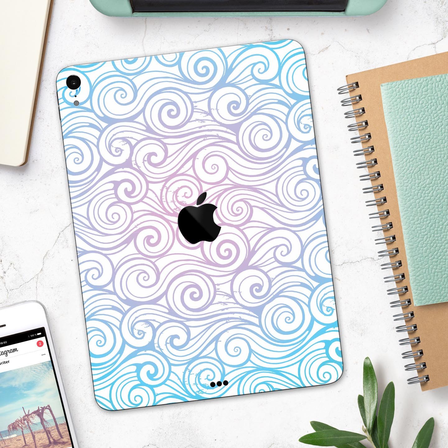 Vivid Blue Gradient Swirl skin decal for Apple iPad, showcasing vibrant colors and a sleek design.