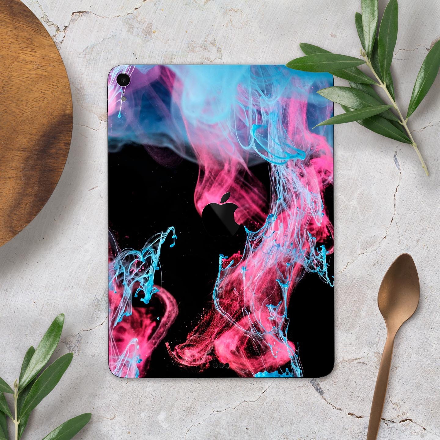 Vivid Pink and Teal liquid Cloud skin decal for Apple devices, showcasing vibrant colors and a sleek design.