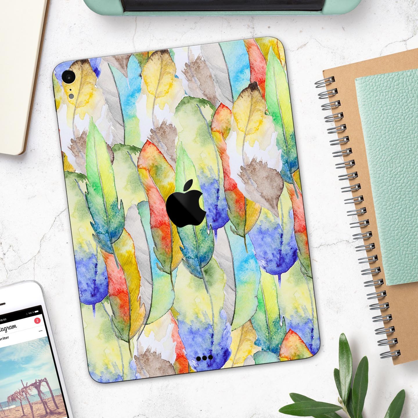 Vivid Watercolor Feather Overlay skin decal for Apple devices, showcasing vibrant colors and intricate feather design.