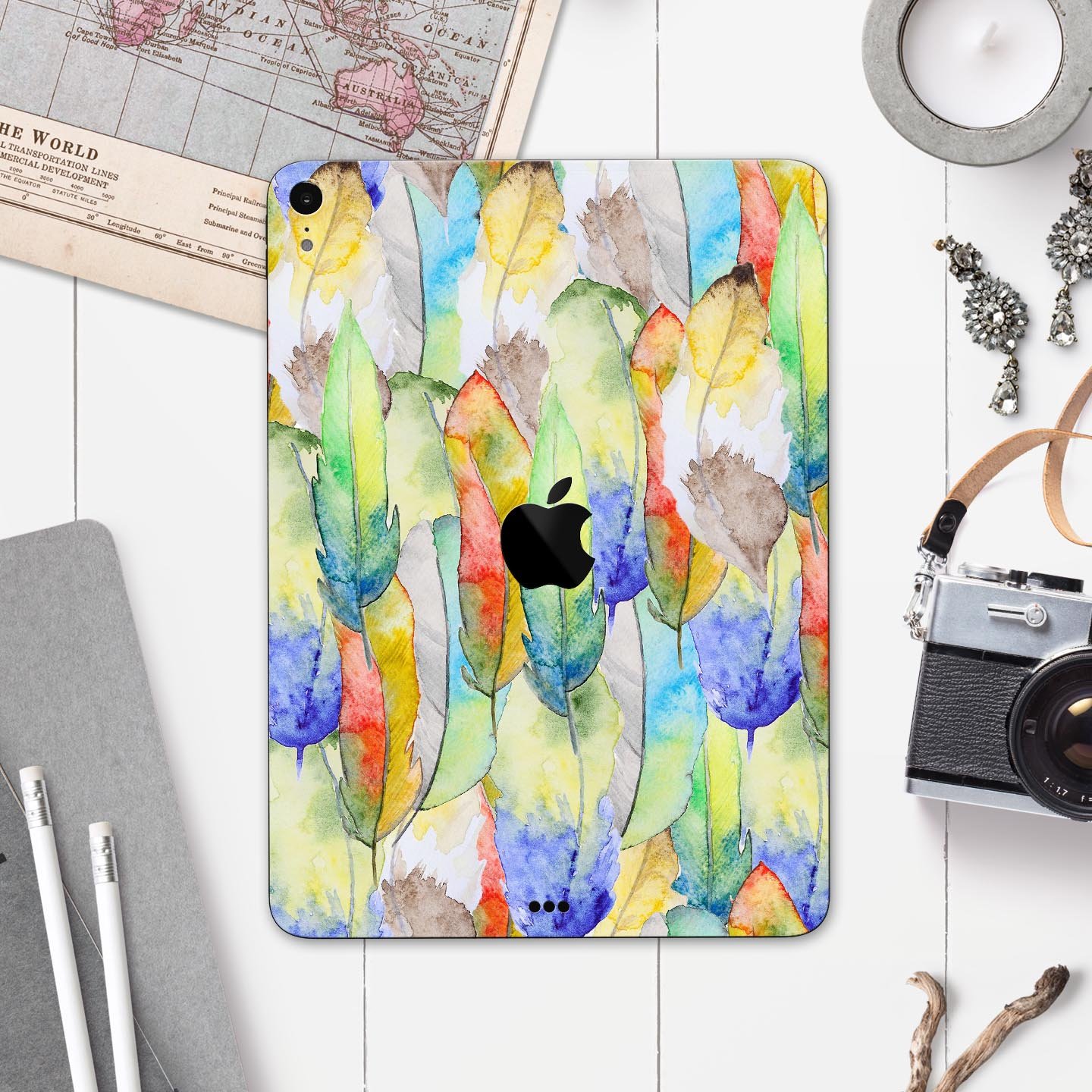 Vivid Watercolor Feather Overlay skin decal for Apple devices, showcasing vibrant colors and intricate feather design.