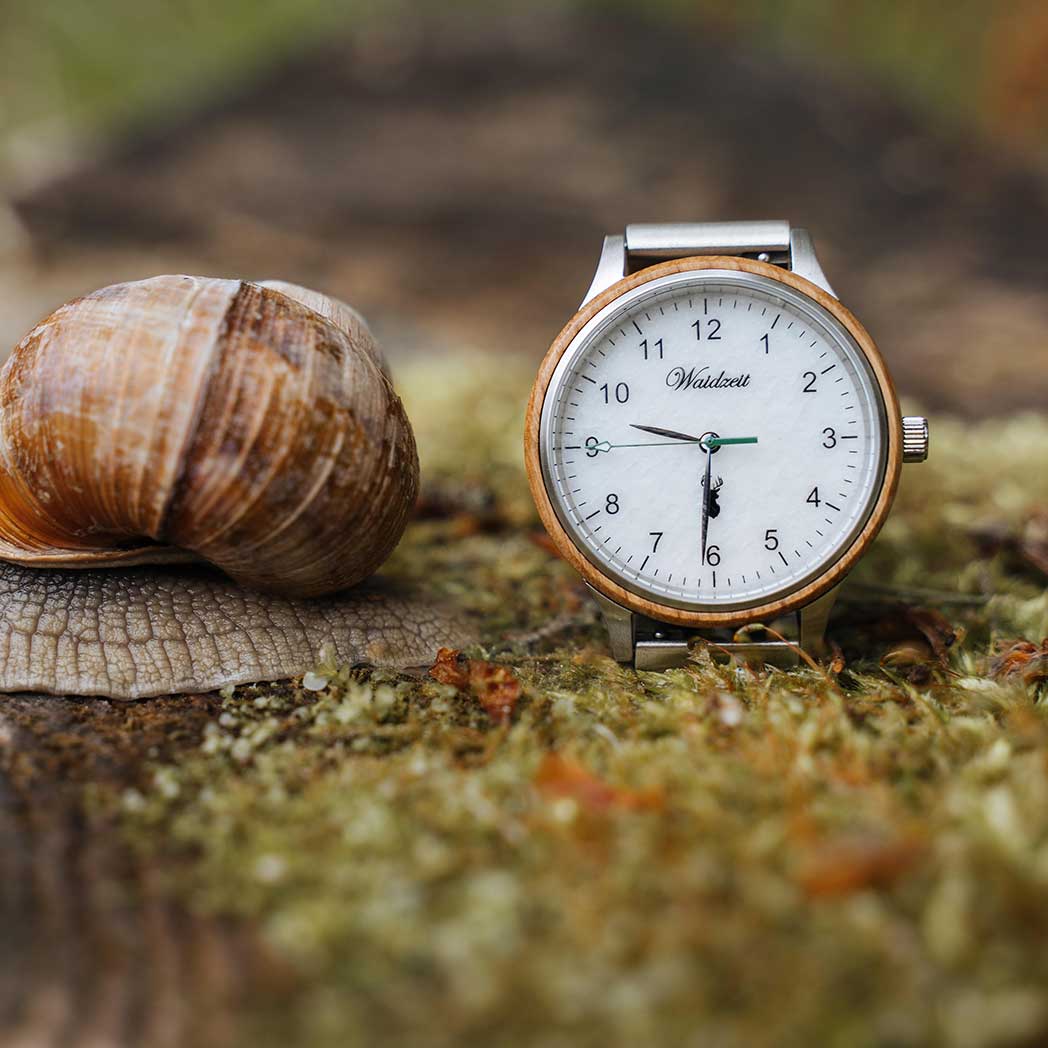 Waidzeit Green Panther Lady watch featuring a wooden design from French wine barrels, with an Austrian marble dial and green second hand.