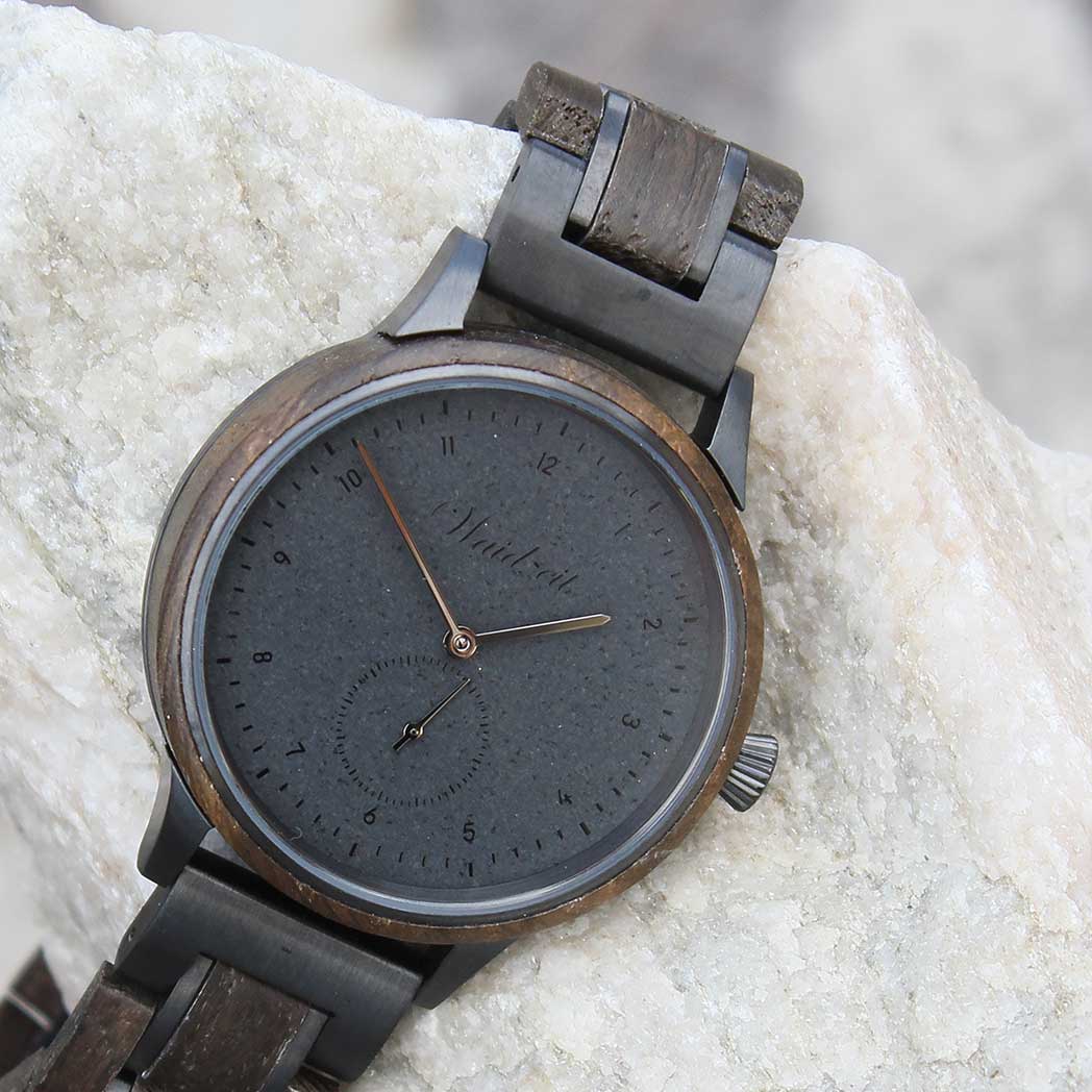 Waidzeit Mystic Black wooden strap watch featuring a bog oak case and elegant design, suitable for unisex wear.