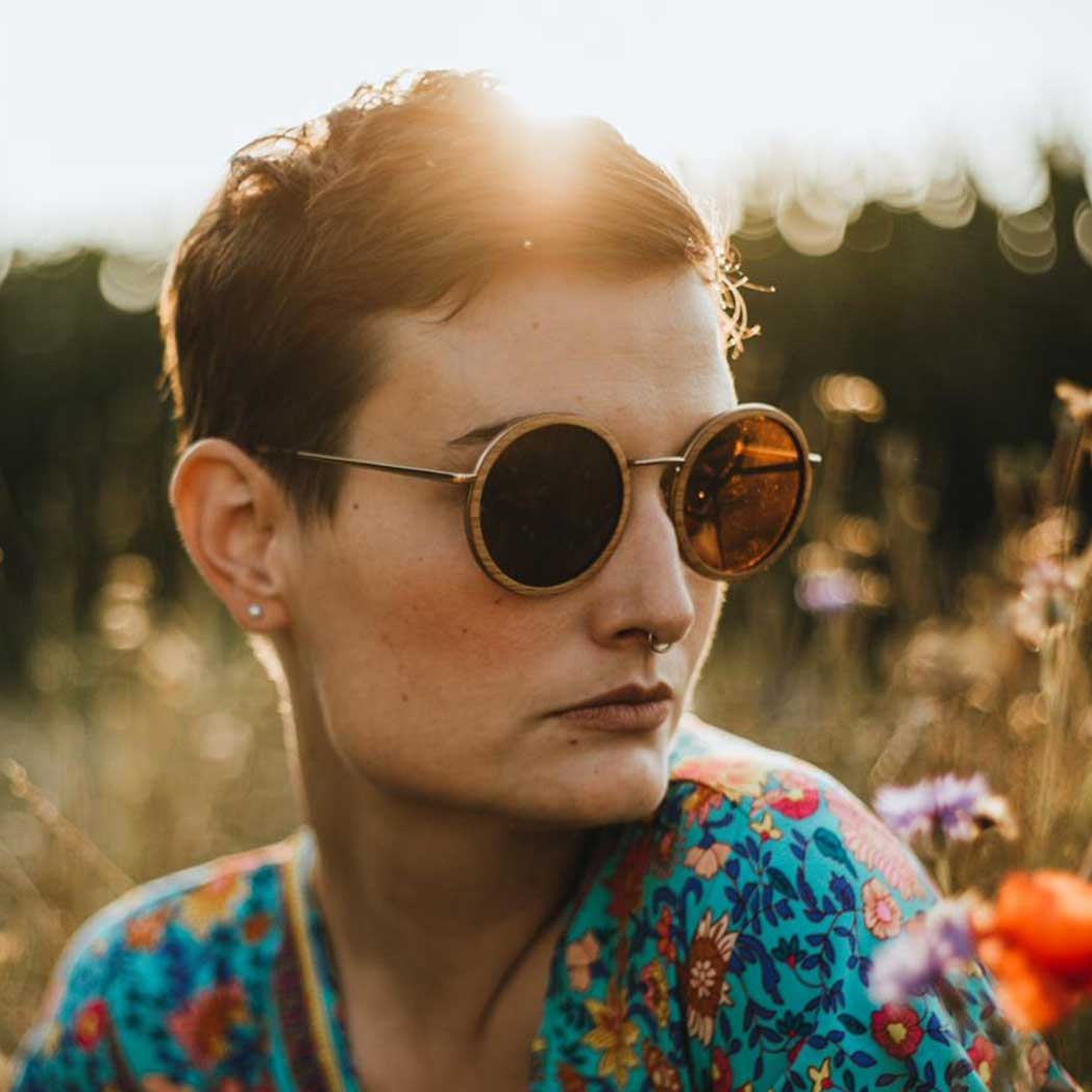 Waidzeit Whisky Taste Sunglasses made from whisky barrels, showcasing unique oak wood grain and stylish design.