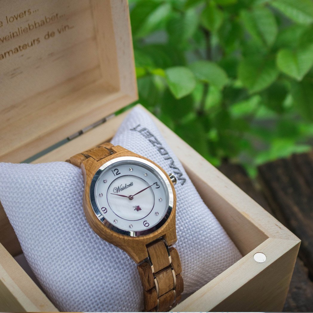 Waidzeit Wine Princess Blanc wooden watch featuring a mother-of-pearl dial, silver vine leaf, and crystal stones, elegantly designed for wine lovers.