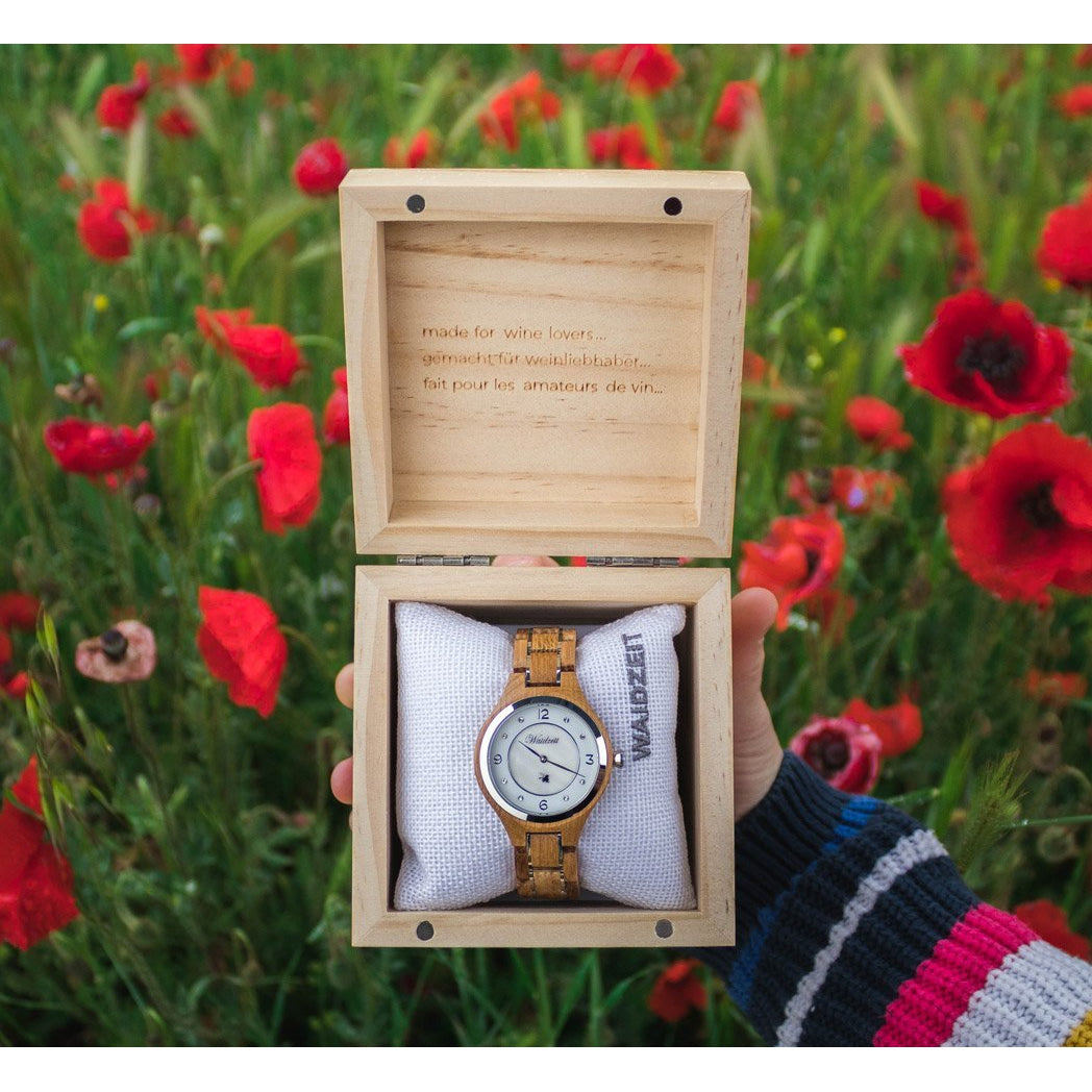 Waidzeit Wine Princess Blanc wooden watch featuring a mother-of-pearl dial, silver vine leaf, and crystal stones, elegantly designed for wine lovers.