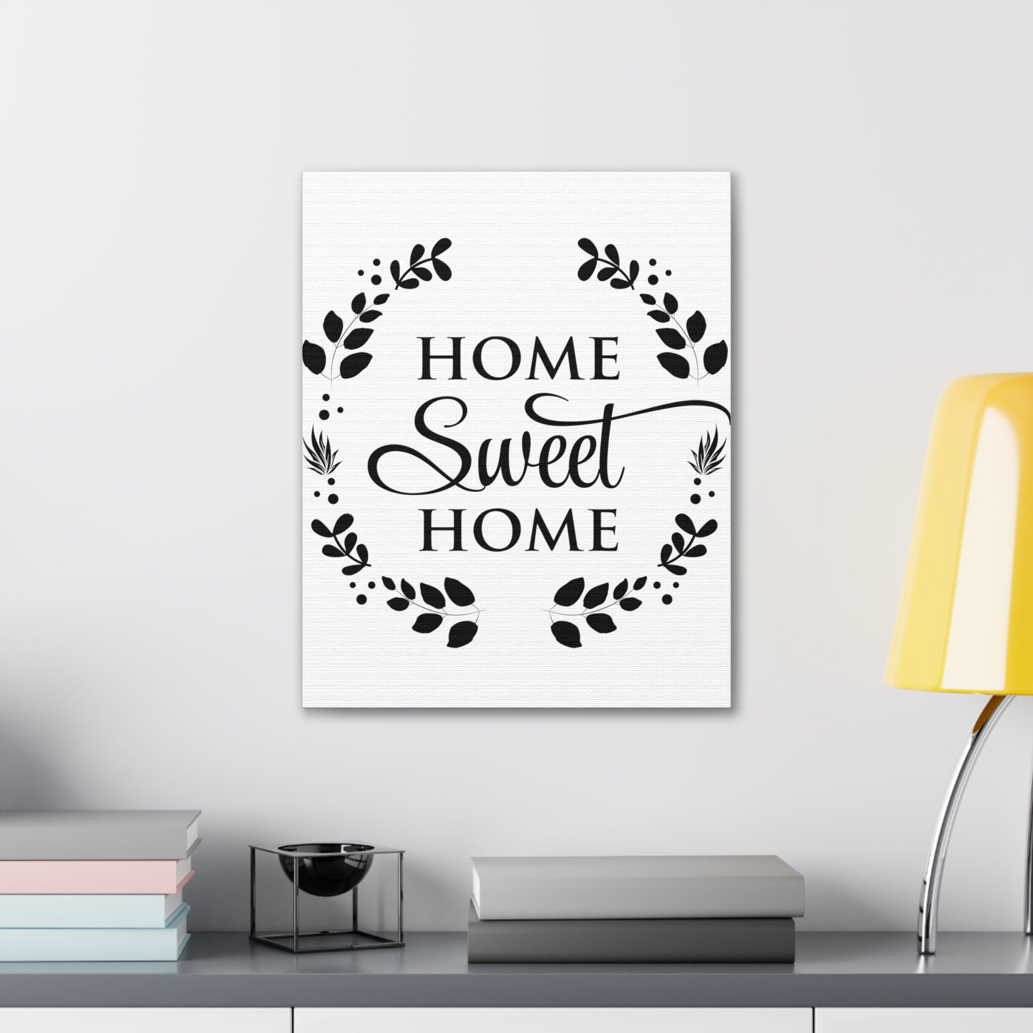 A beautifully designed canvas print featuring the phrase 'Home Sweet Home', showcasing vibrant colors and a textured finish, perfect for home decor.