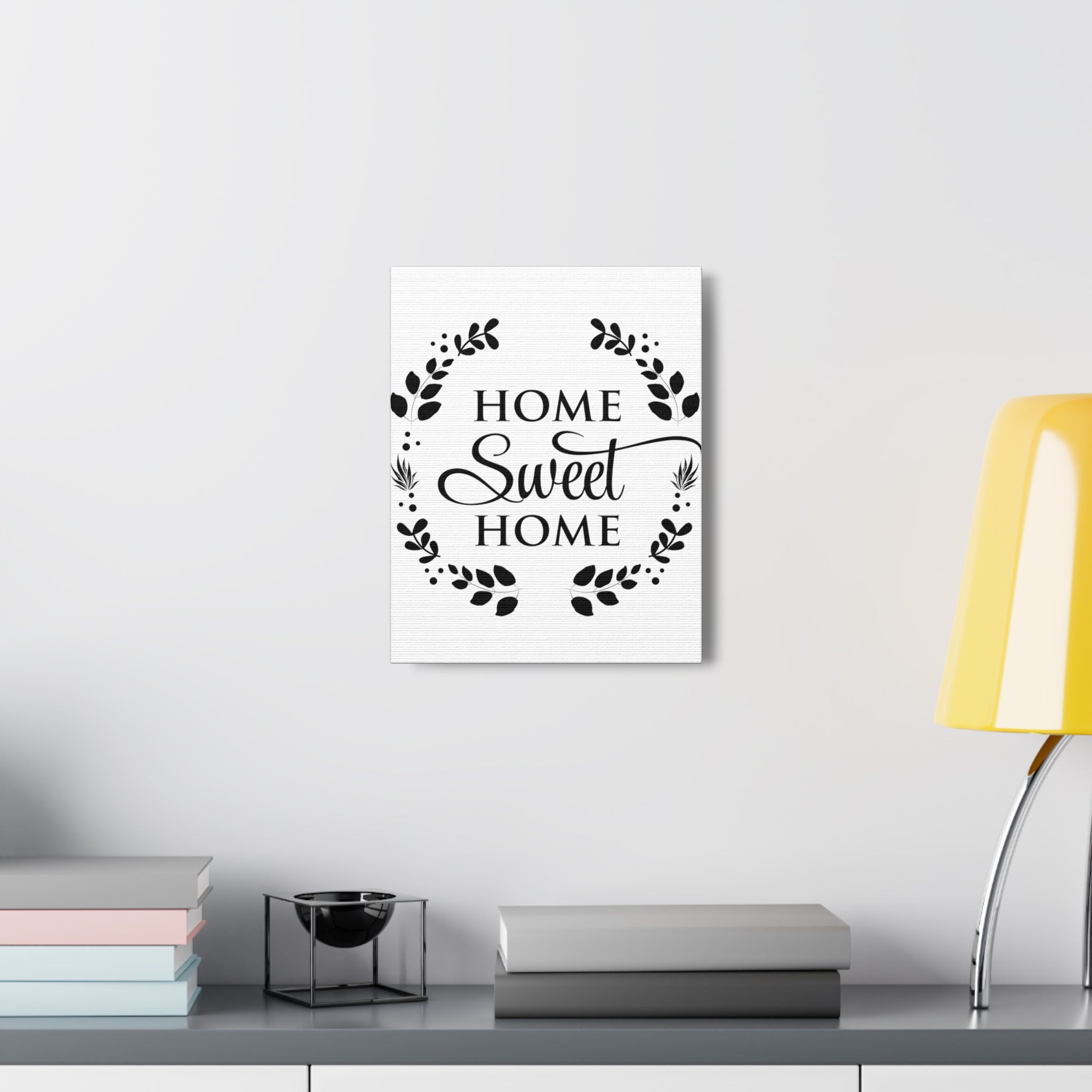 A beautifully designed canvas print featuring the phrase 'Home Sweet Home', showcasing vibrant colors and a textured finish, perfect for home decor.