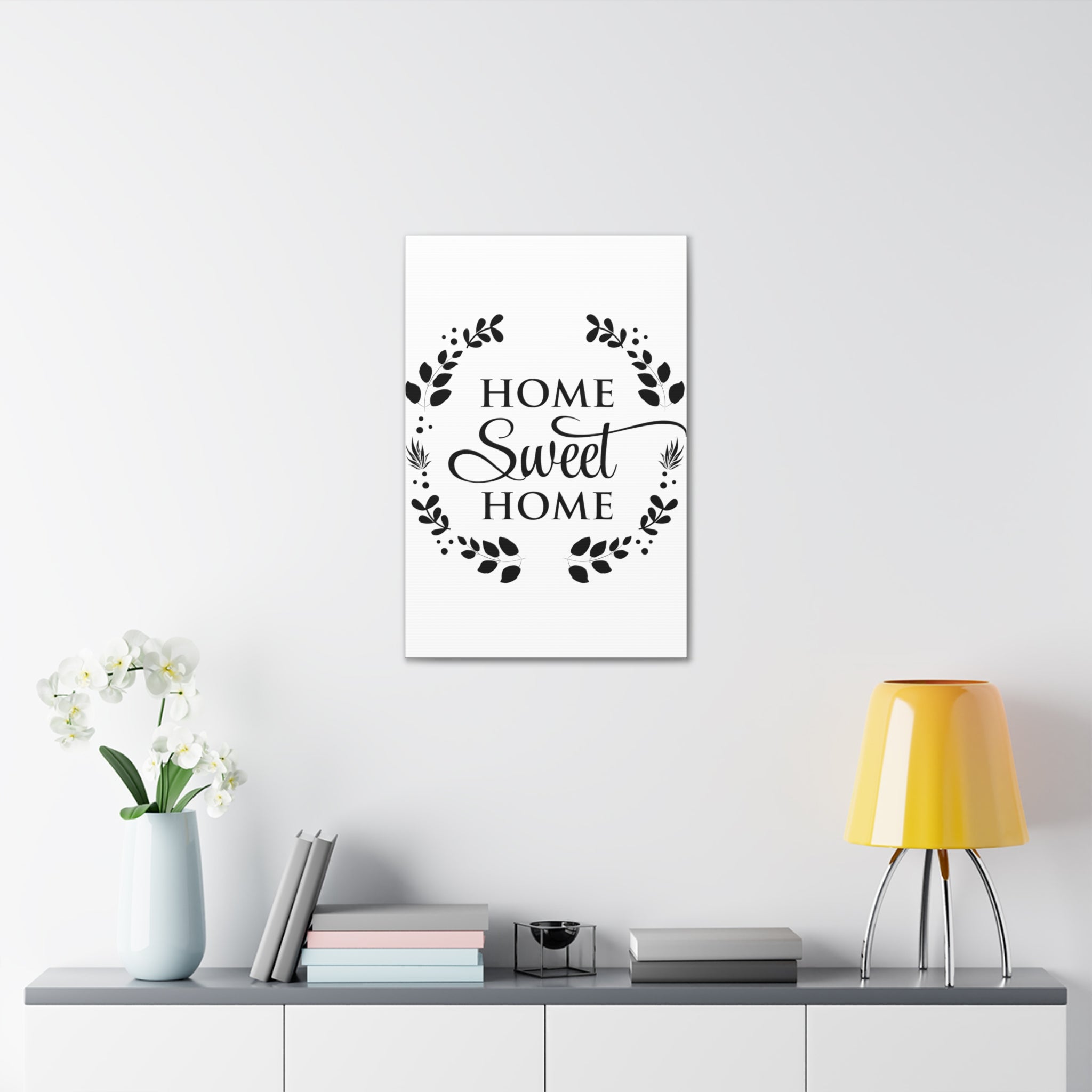 A beautifully designed canvas print featuring the phrase 'Home Sweet Home', showcasing vibrant colors and a textured finish, perfect for home decor.