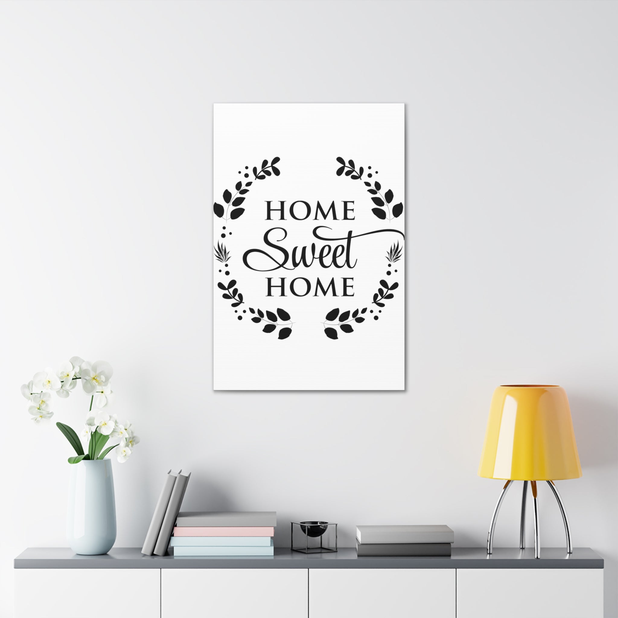 A beautifully designed canvas print featuring the phrase 'Home Sweet Home', showcasing vibrant colors and a textured finish, perfect for home decor.