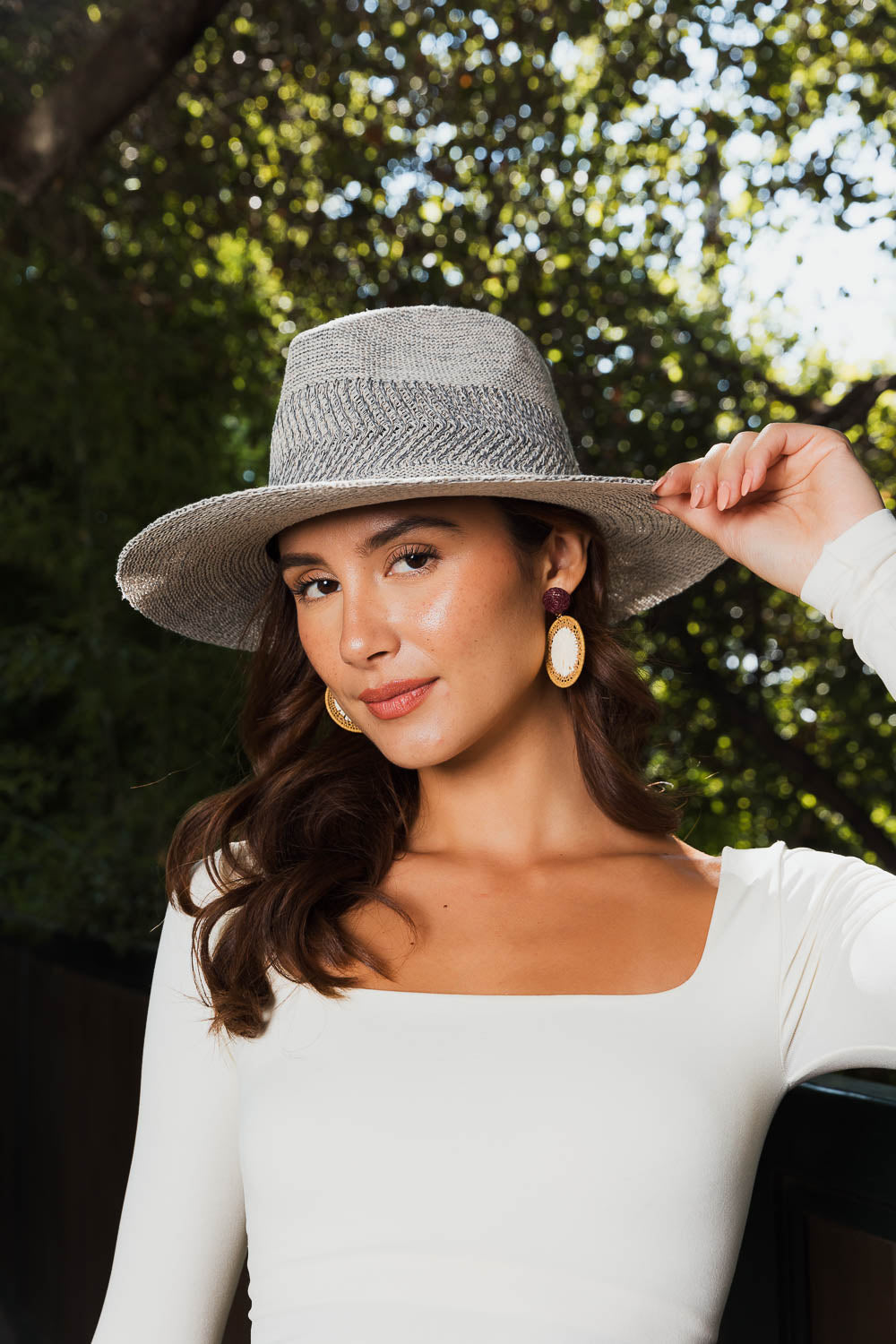 Wanderlust Wide Brim Pinched Front Hat with stylish pinch crown design, perfect for outdoor adventures and sun protection.