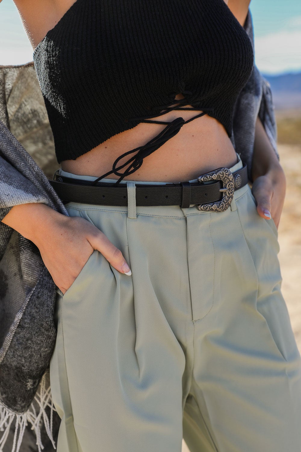 A stylish Western style fashion belt made from durable materials, featuring a classic western design suitable for casual outfits.