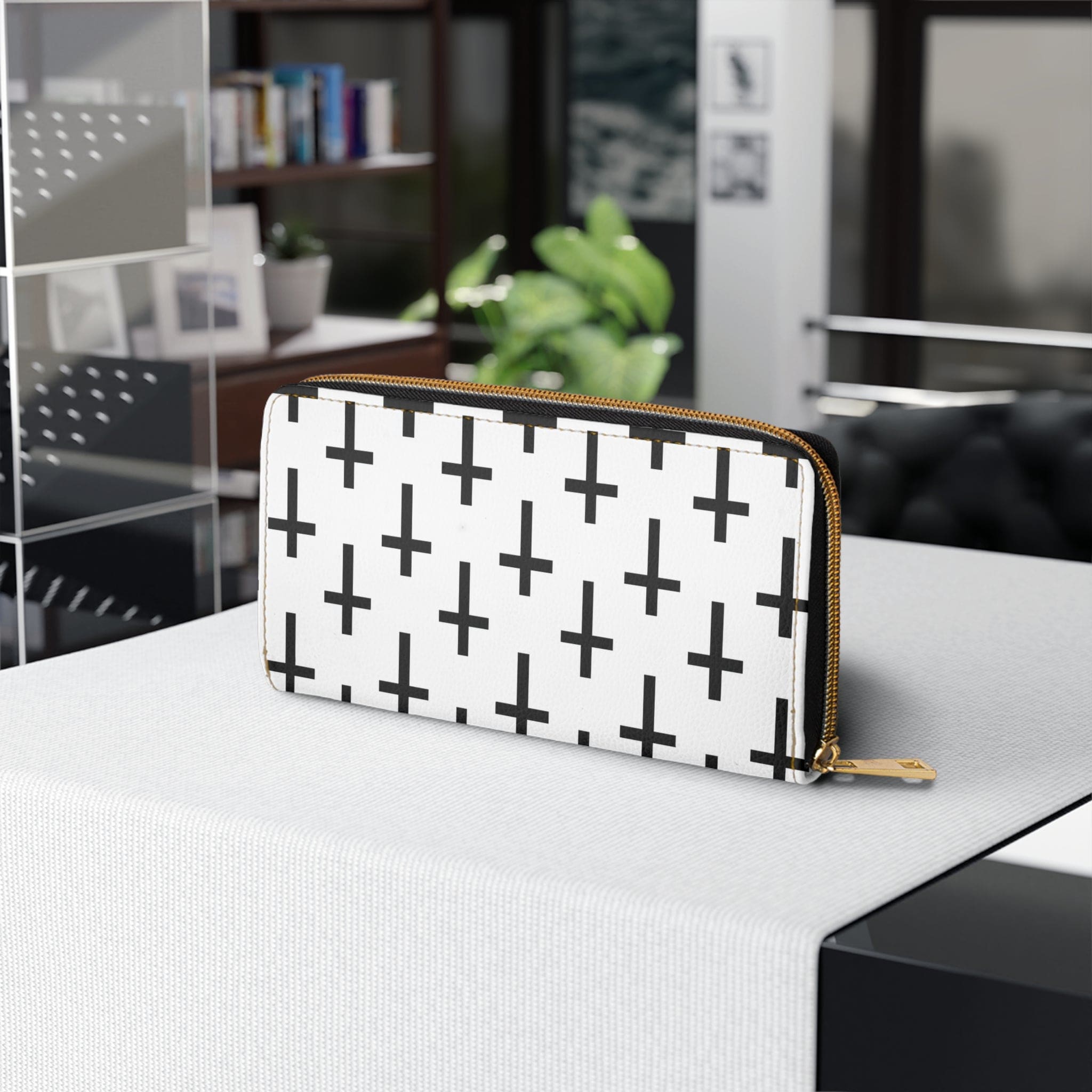 White and black seamless cross pattern women's zipper wallet clutch showcasing its stylish design and functional compartments.