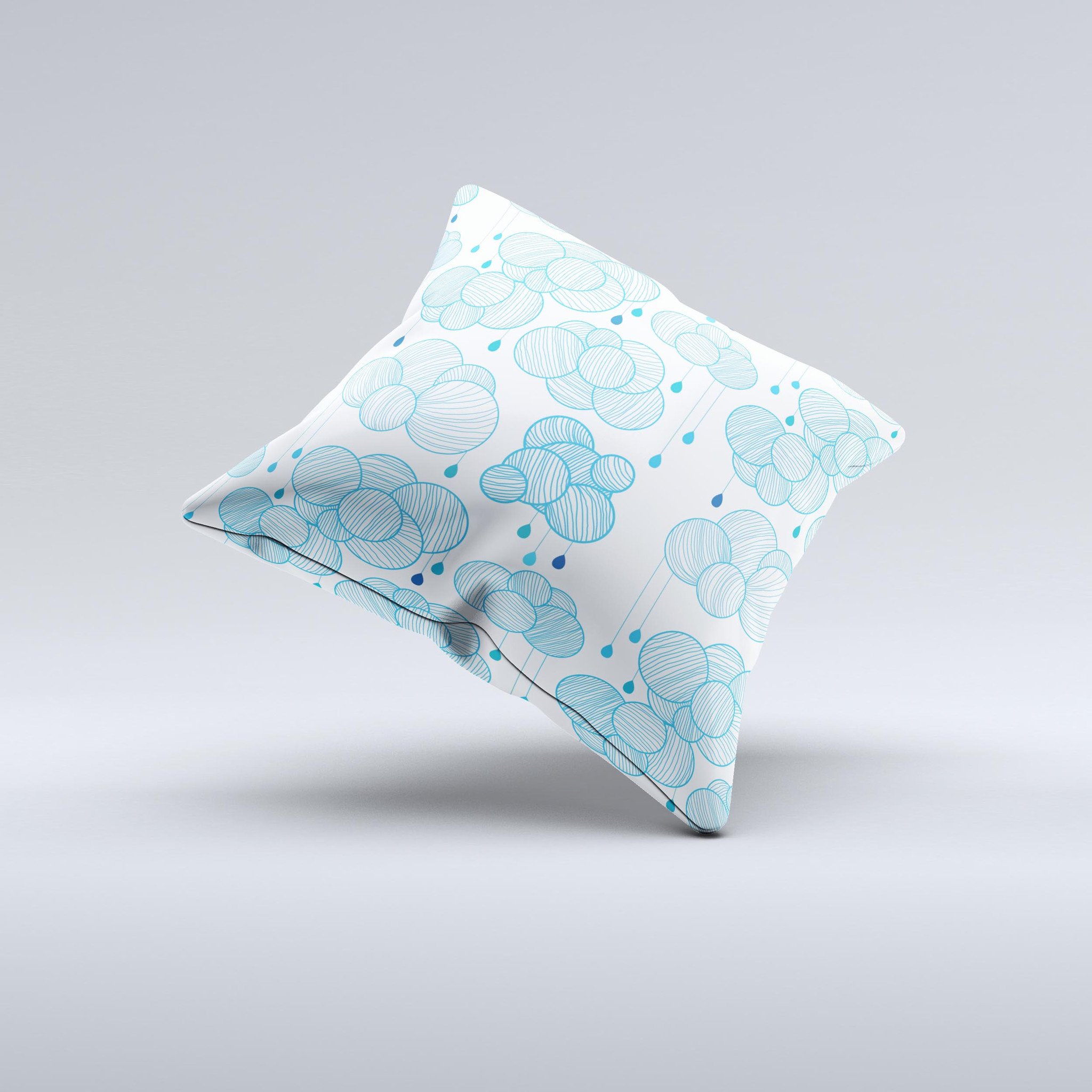 Handcrafted White and Blue Raining Yarn Clouds decorative throw pillow with high thread count fabric and unique design.