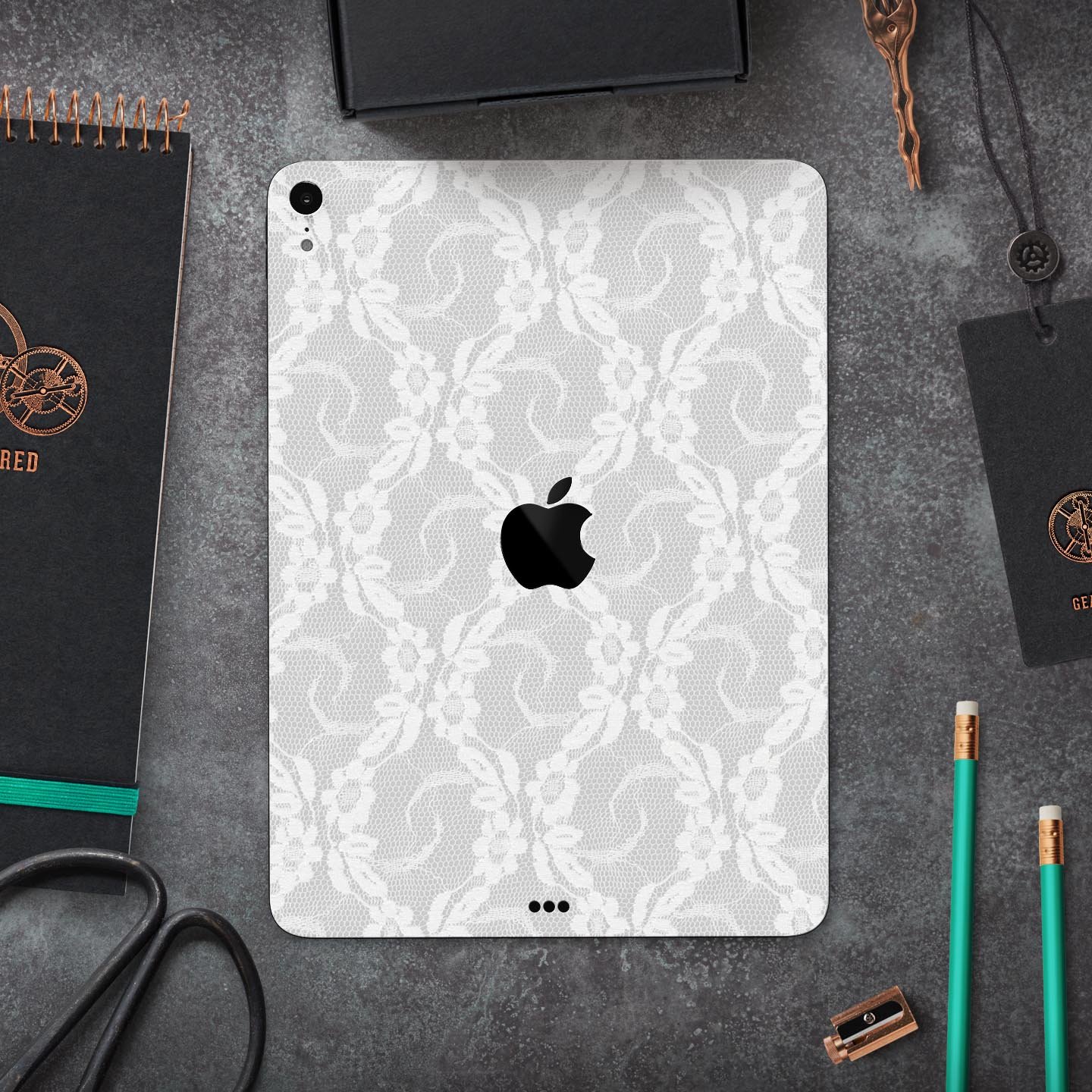 White Floral Lace Full Body Skin Decal for Apple iPad Pro 12.9, showcasing intricate floral patterns on a sleek surface.