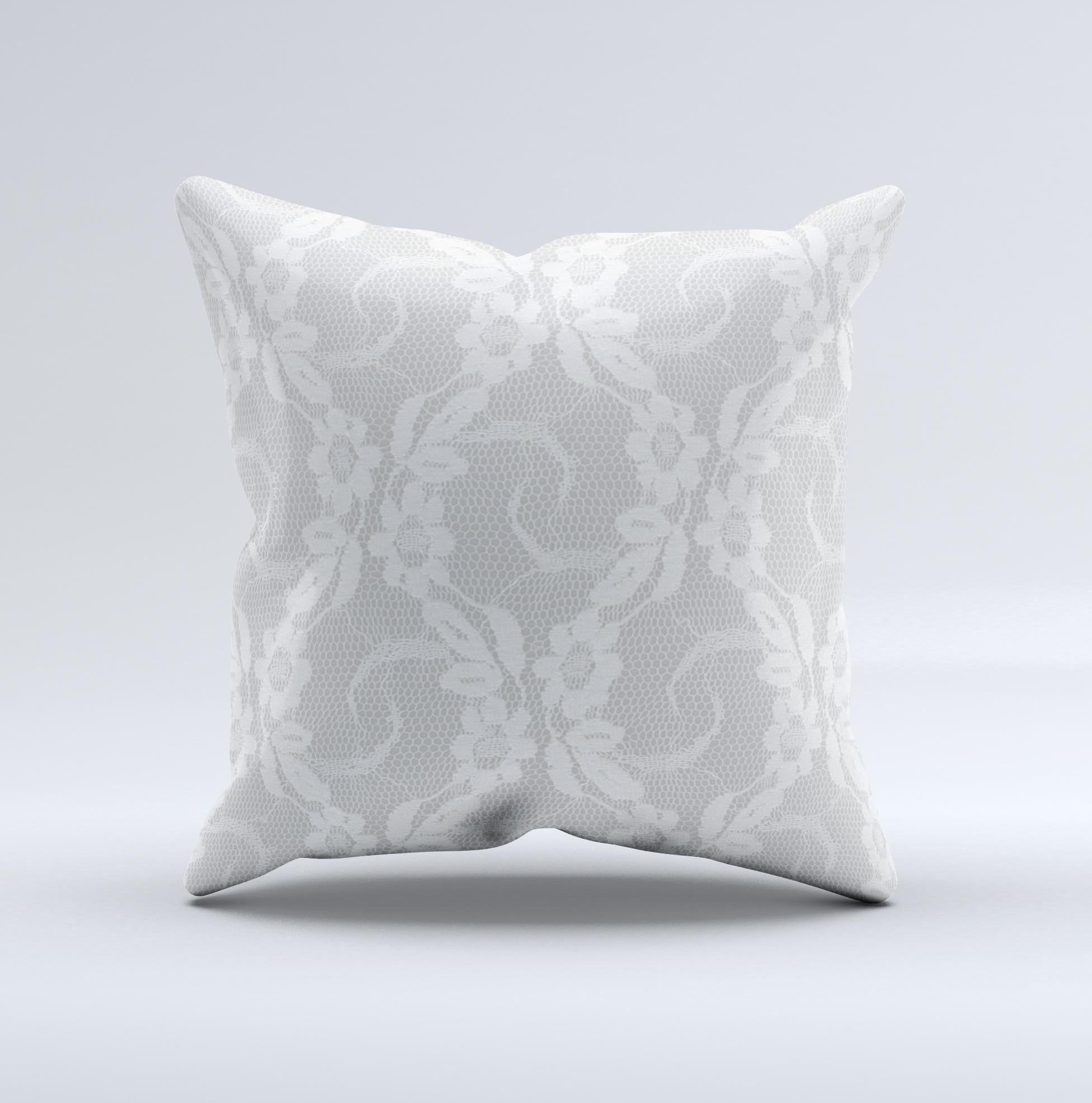 A beautifully handcrafted White Floral Lace Ink-Fuzed Decorative Throw Pillow featuring intricate floral designs, perfect for home decor.