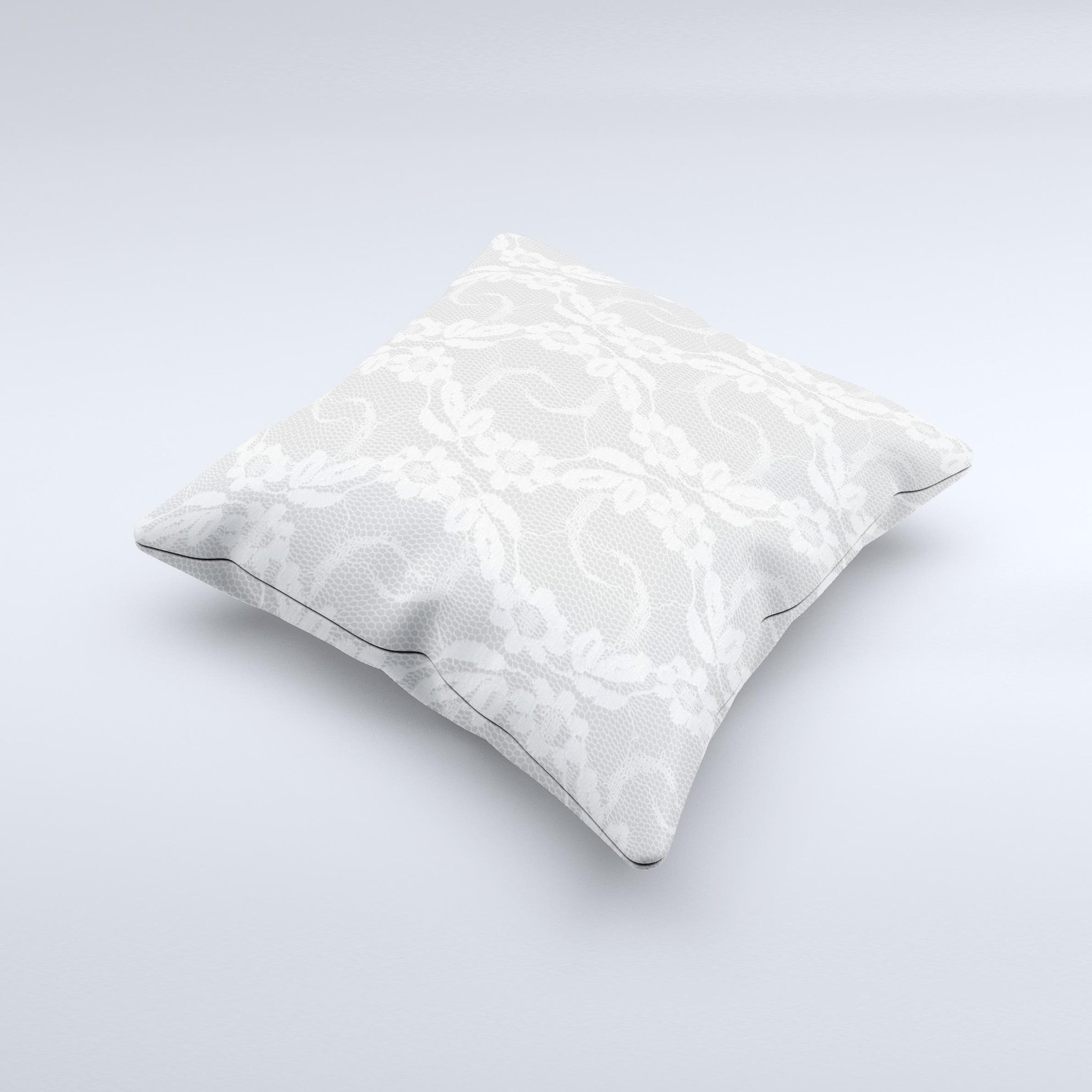 A beautifully handcrafted White Floral Lace Ink-Fuzed Decorative Throw Pillow featuring intricate floral designs, perfect for home decor.