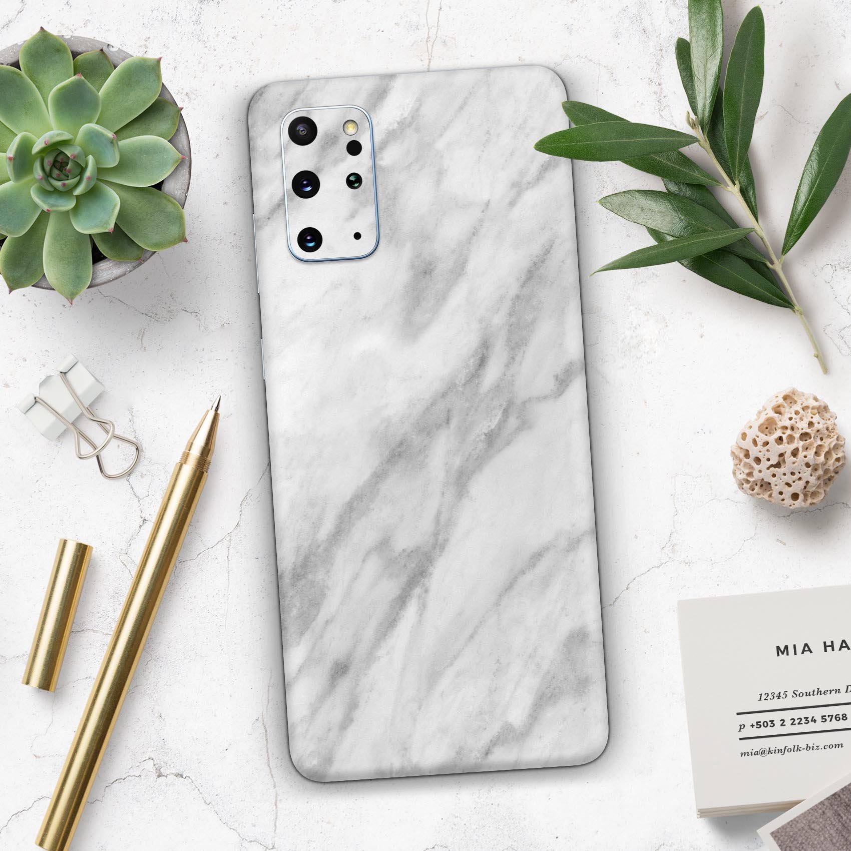 White Marble Surface Skin-Kit for Samsung Galaxy S20, showcasing a stylish marble design on a sleek device.